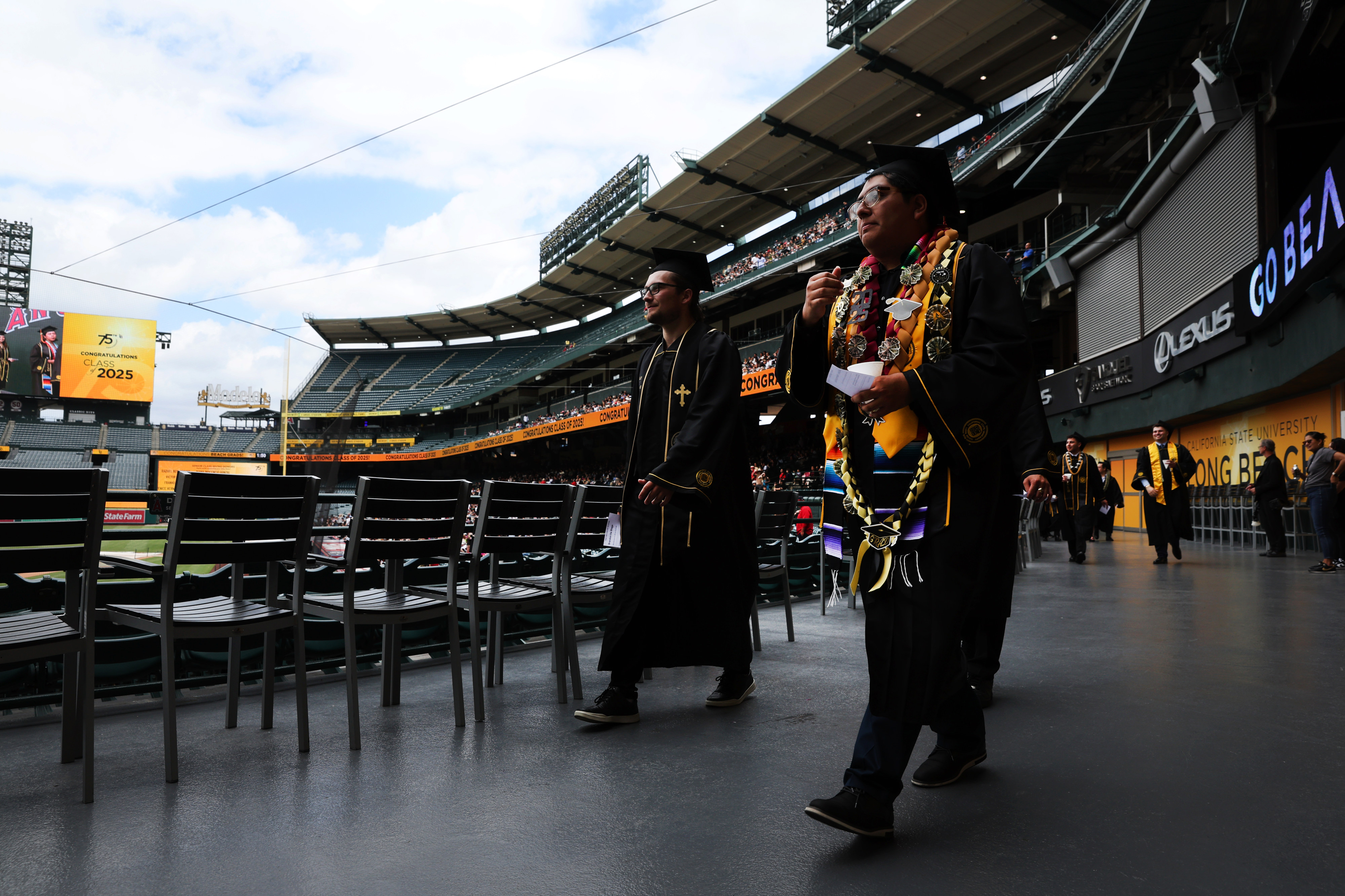 Cal State Long Beach College of Engineering graduates walk into...