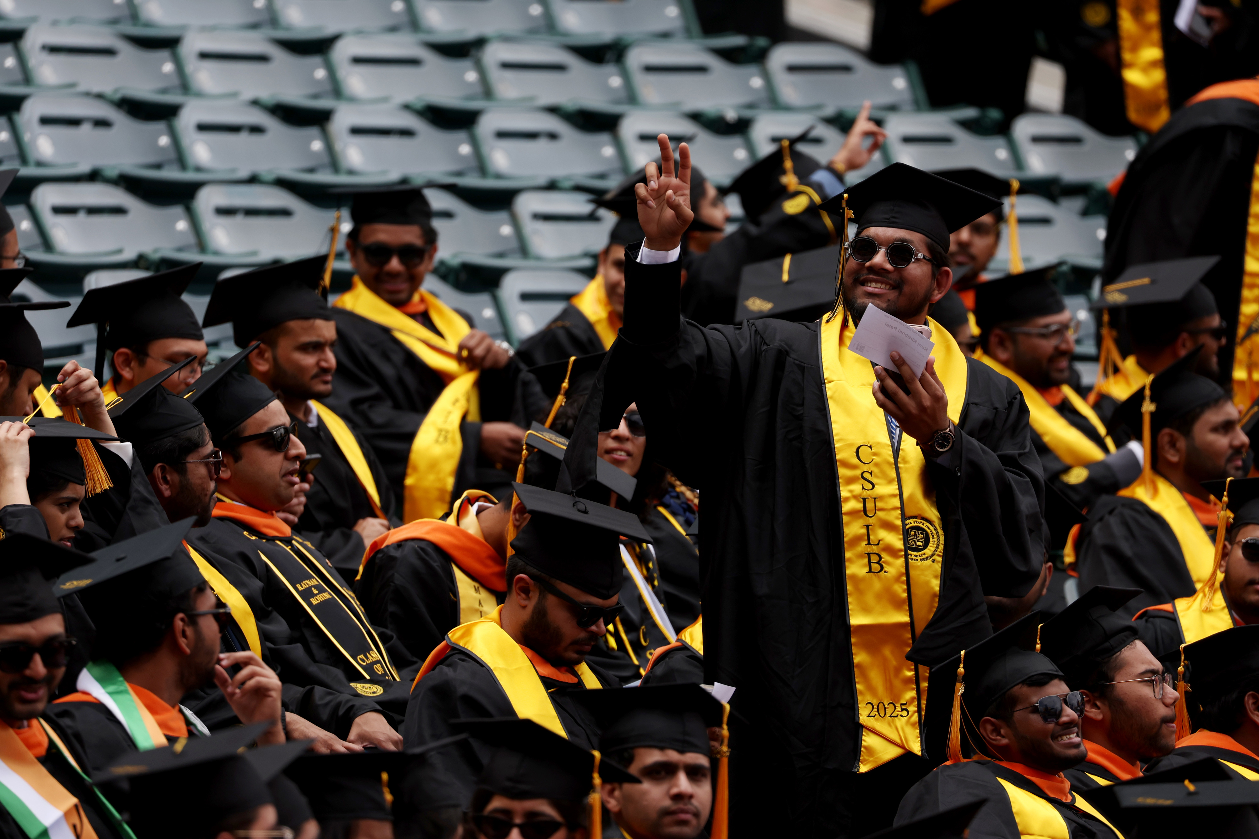 Cal State Long Beach College of Engineering graduates celebrate during...