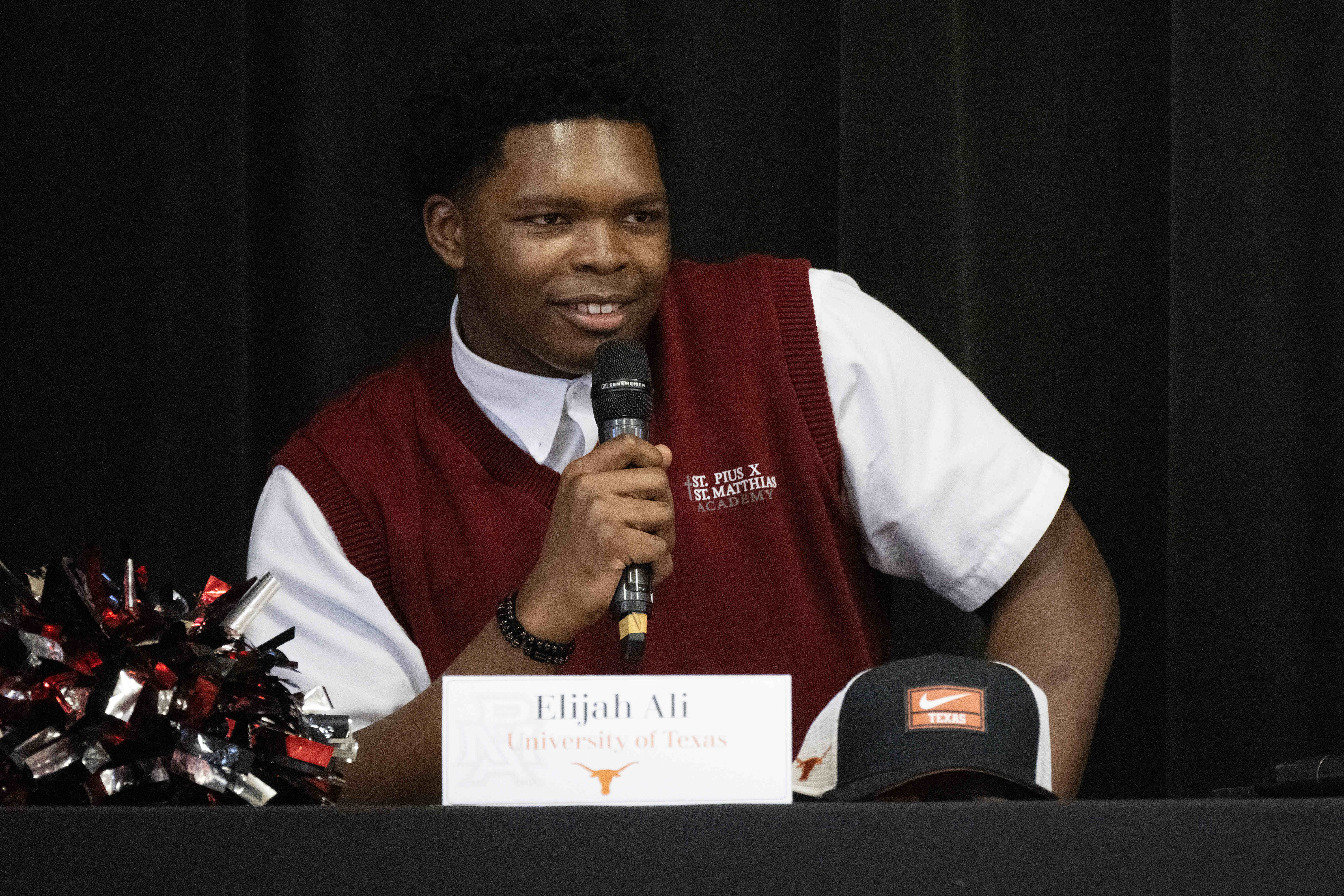 Elijah Ali speaks during a National Signing Day ceremony at...