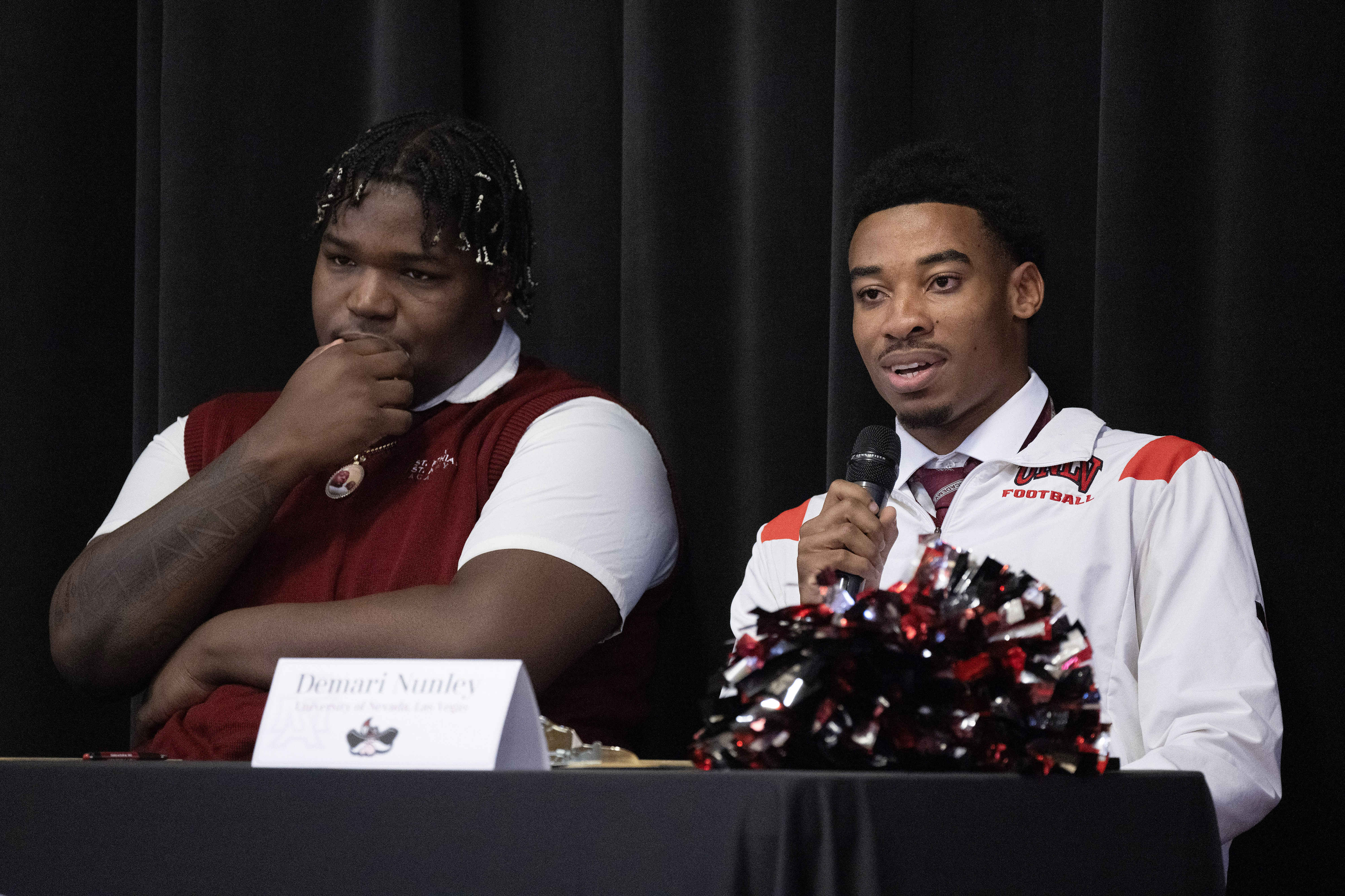 Demari Nunley, right, speaks during a National Signing Day ceremony...