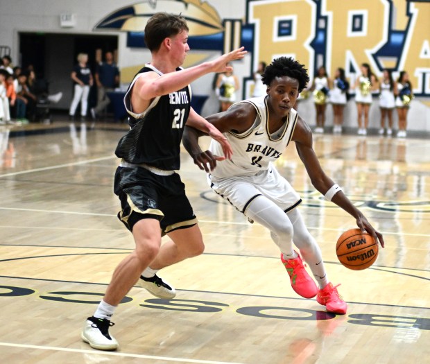 Christian Collins #11 of St. John Bosco's drives past Jake Schutt #21 of Servite during the first half of a prep boys basketball game at St. John Bosco High School on Friday, January 30, 2026. (Photo by Libby Cline Birmingham, Contributing Photographer)