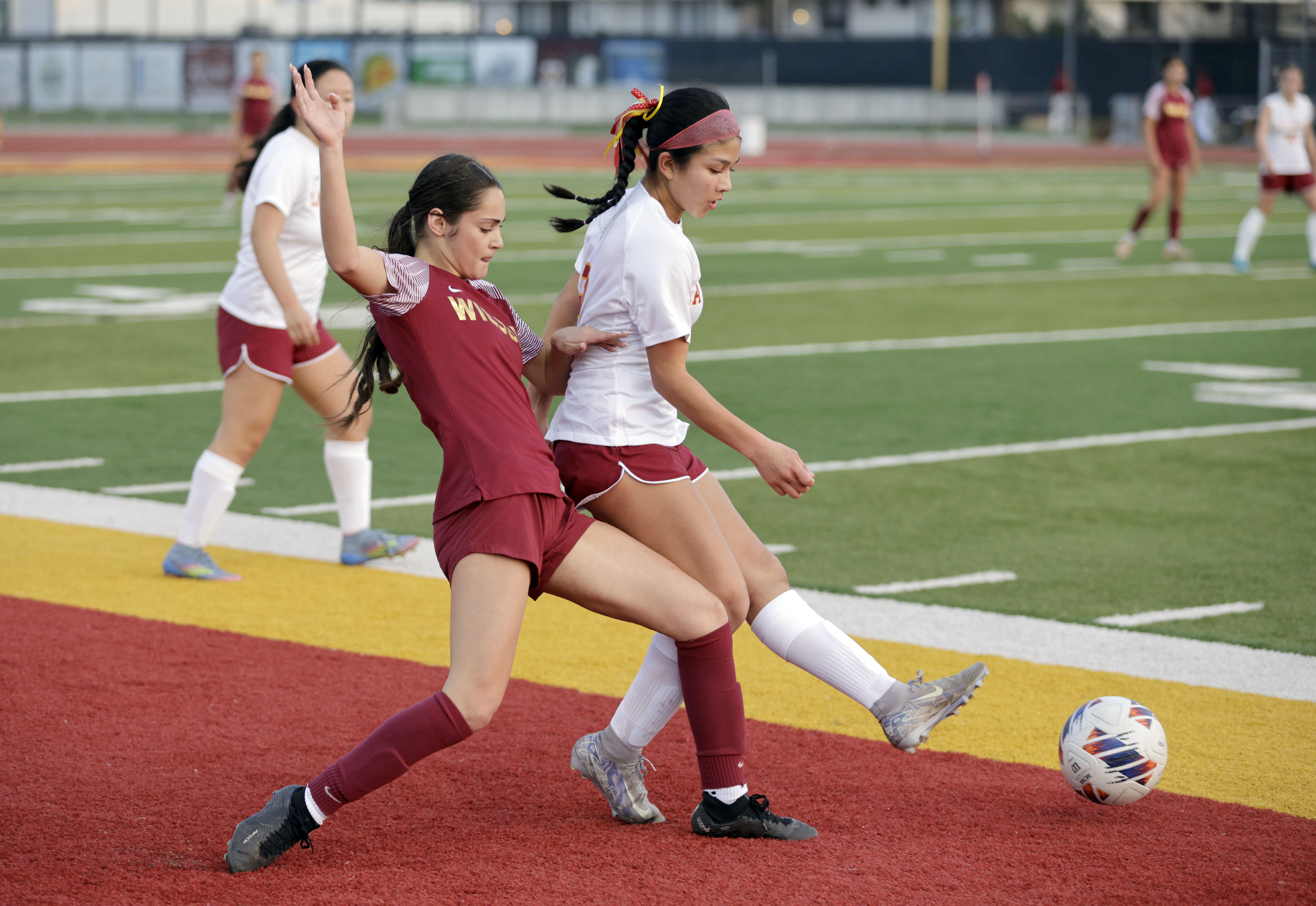 Wilson’s Evan Cassidy (3) tries to get the ball from...