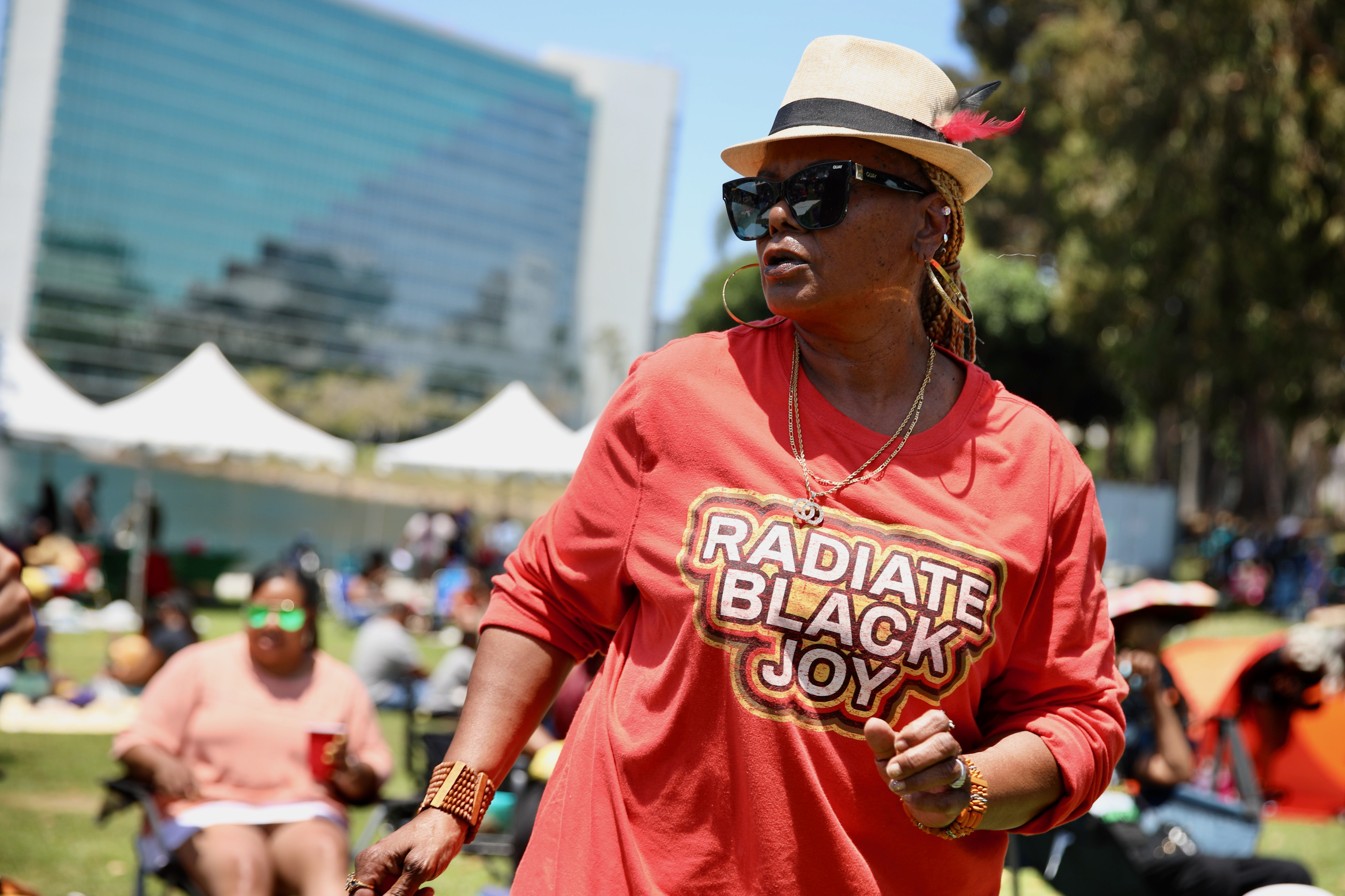 Jacqueline Brent of Los Angeles moves to the music at...