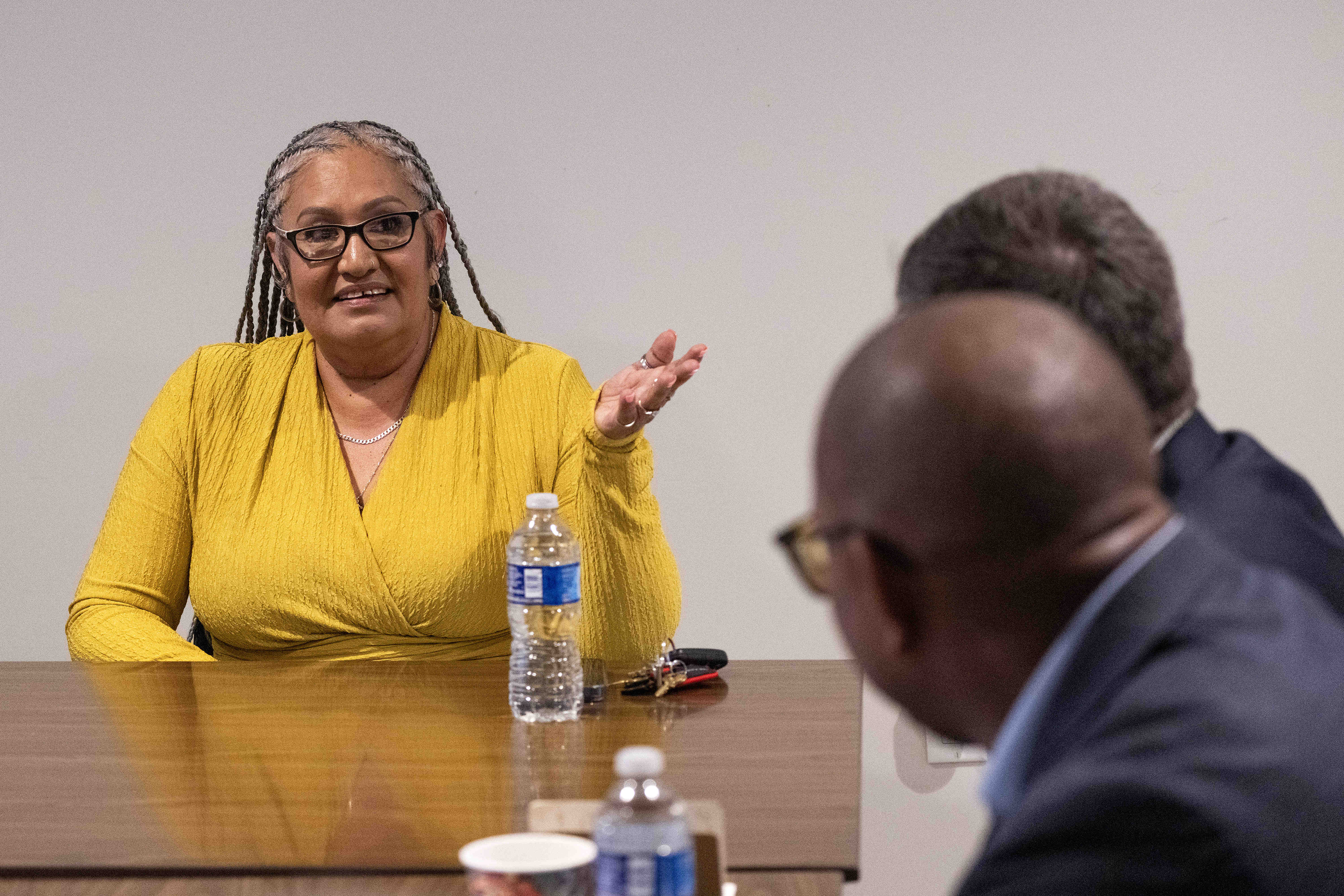 Laura Moreno speaks with Mayor Rex Richardson and Secretary of...