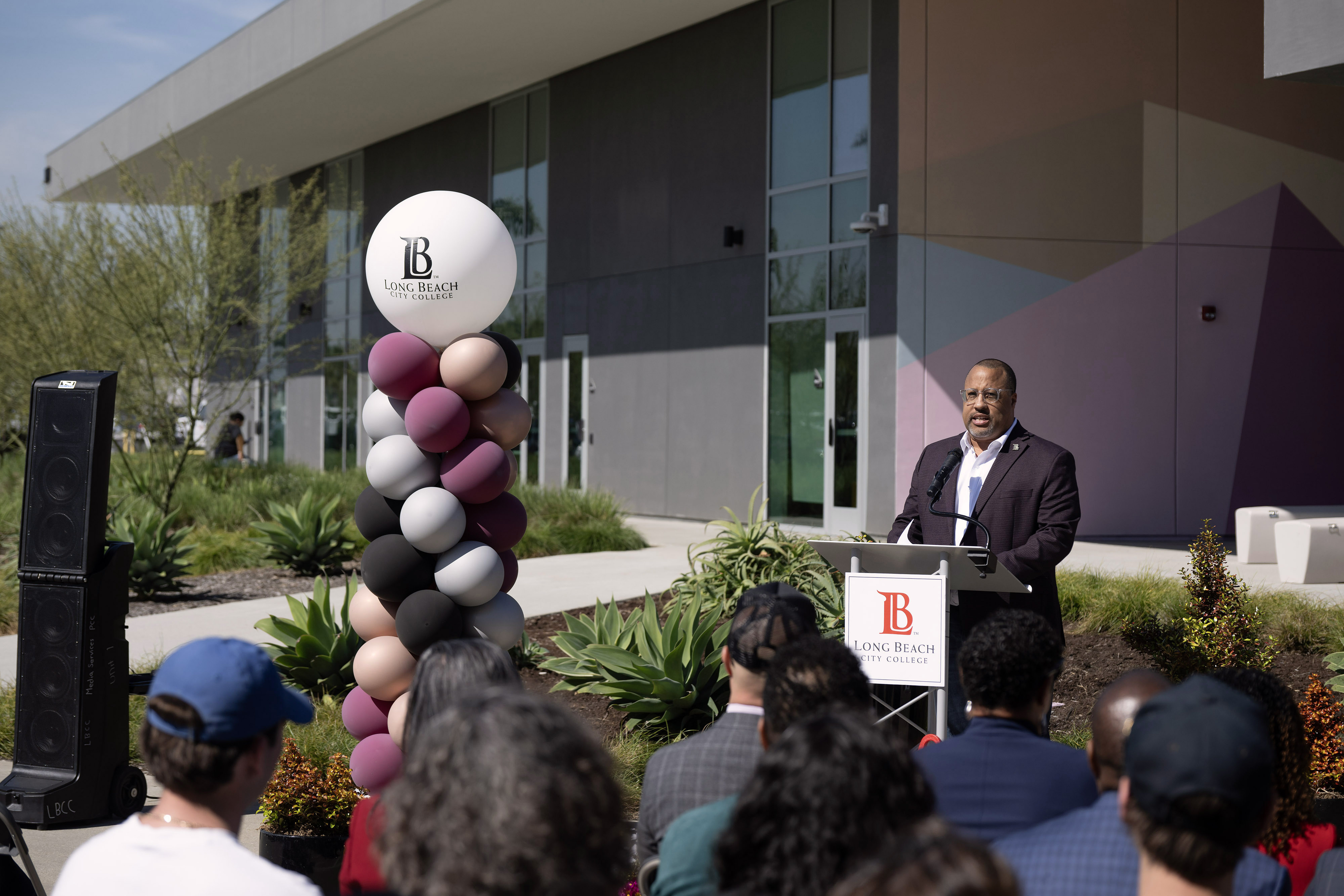 Board of Trustees President Uduak-Joe Ntuk speaks during a ribbon-cutting...