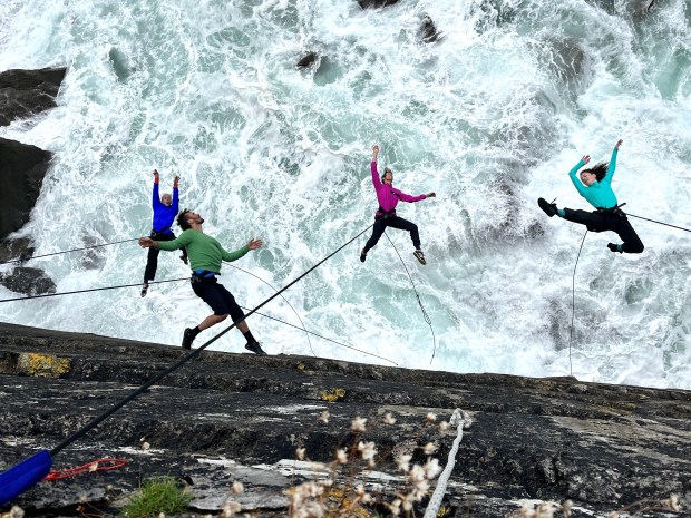 Dancers perform on an ocean cliff in Ireland in 2023 as part of an international arts project led by Amelia Rudolph, founder of the Bandaloop and A.R.M.A. dance groups in Oakland, Calif. (Amelia Rudolph)