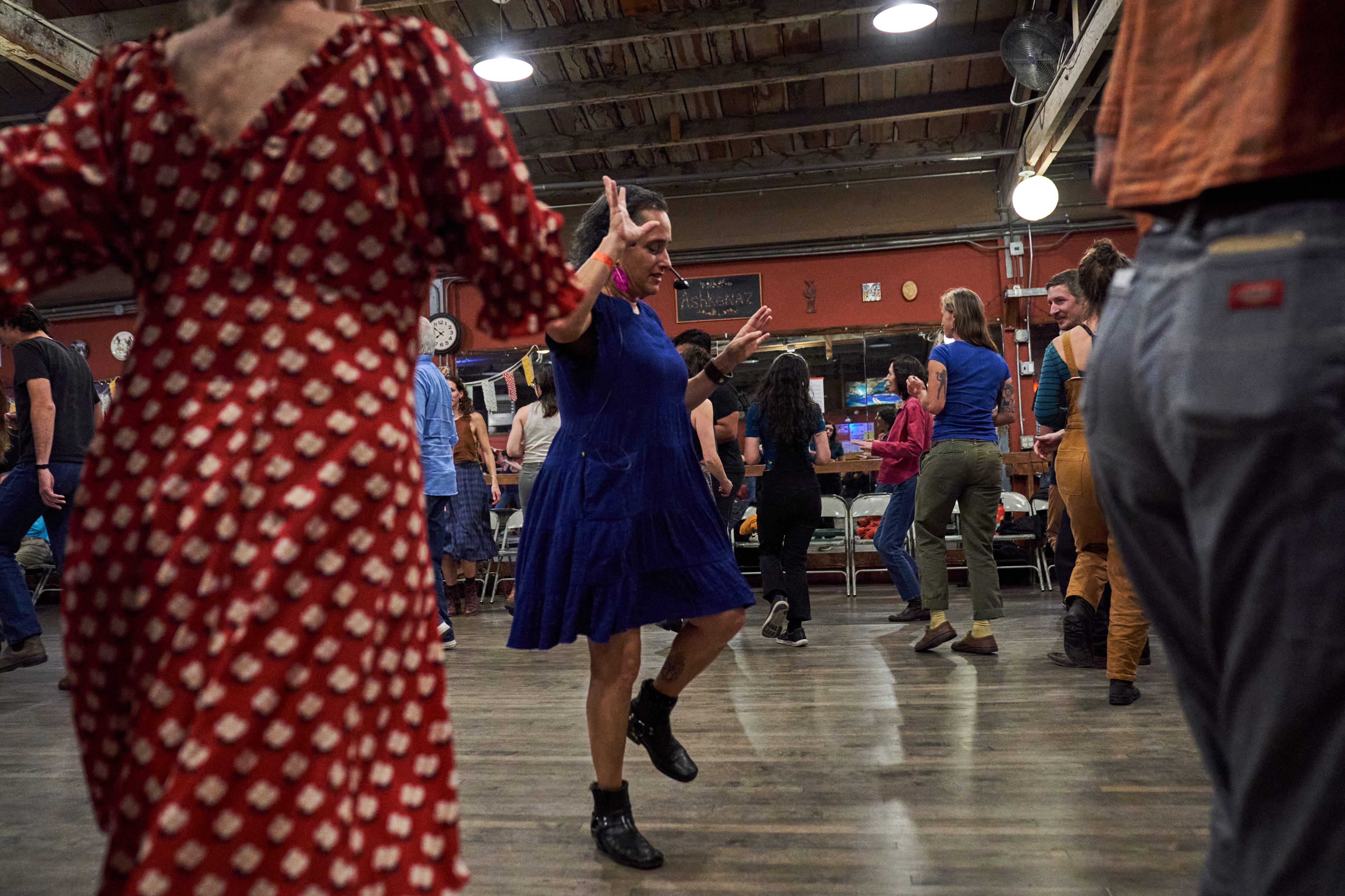 Evie Ladin, center, leads a clogging workshop during the Dare...
