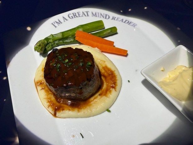 Magician's Circle: Steak Au Poivre: an Angus fillet mignon with pomme purée, glazed asparagus and a green pepper sauce. (Chris Riley/Times-Herald)