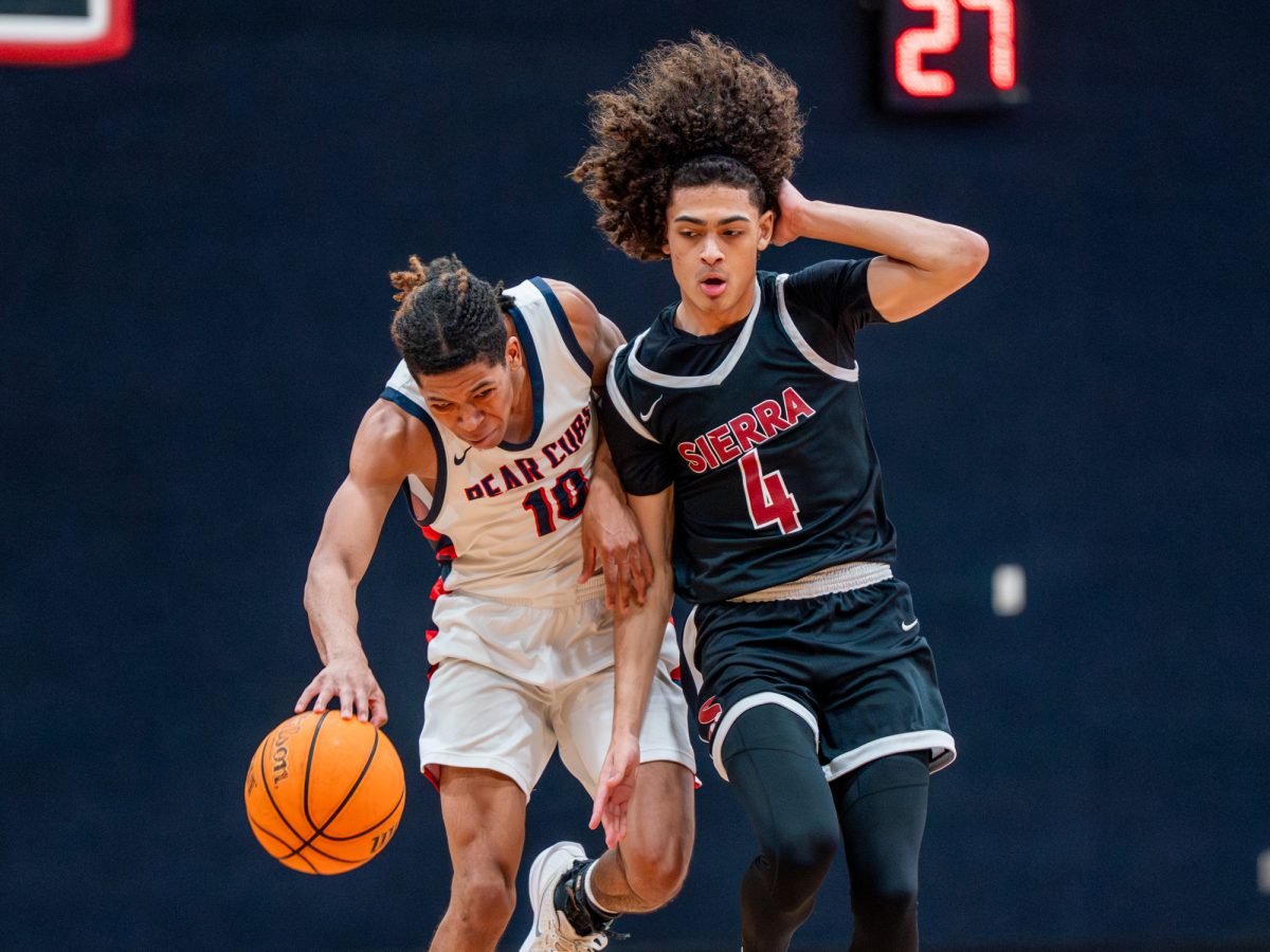 Santa Rosa guard Amari Grey, left, braces against Sierra defense during the game against Sierra on Tuesday, Feb. 10 in Haehl Pavilion.