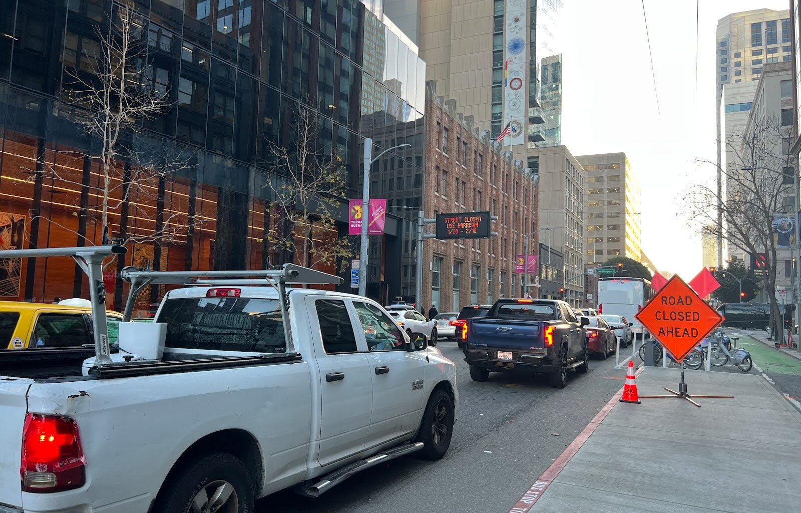 San Francisco street with "Road Closed Ahead" sign.