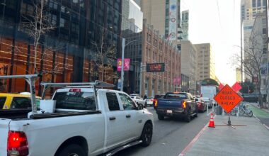 San Francisco street with "Road Closed Ahead" sign.