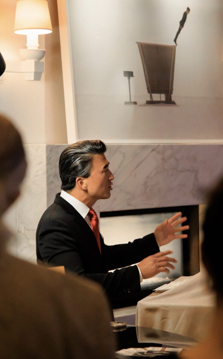 Los Angeles City Council District 5 candidate Eddie Ha speaking at a charity event