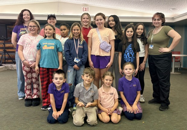 Cast and crew members of "Finding Nemo Kids," a musical version of the 2003 animated movie, gather for a rehearsal as they prepare for two public performances in March in Point Loma. (Coco Sein)