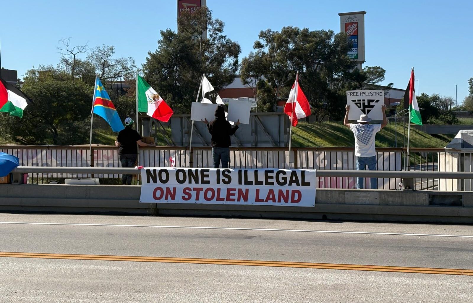 Protest banners on California freeways