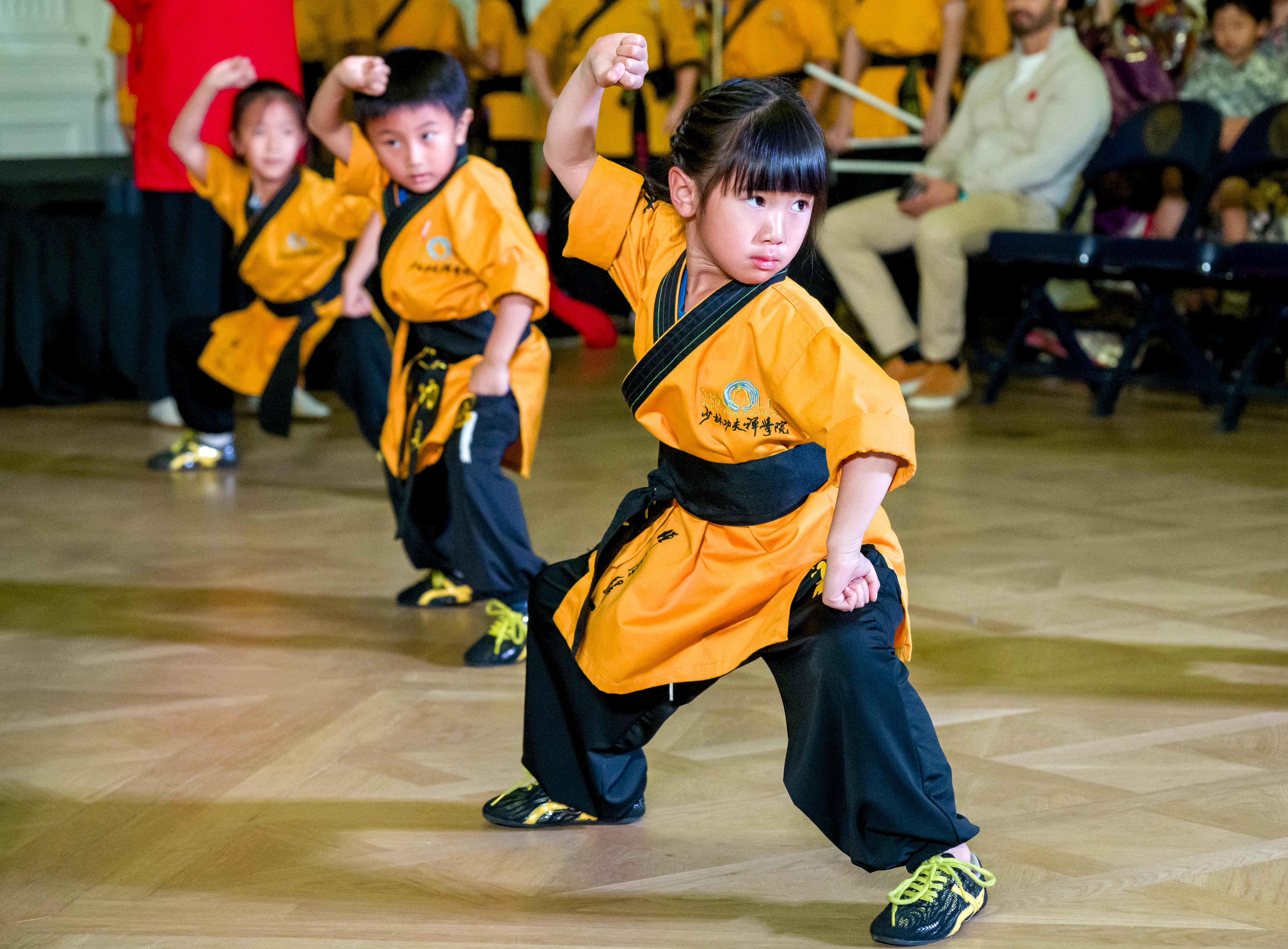 Children from the Shaolin Kung Fu Chan Academy demonstrate their...