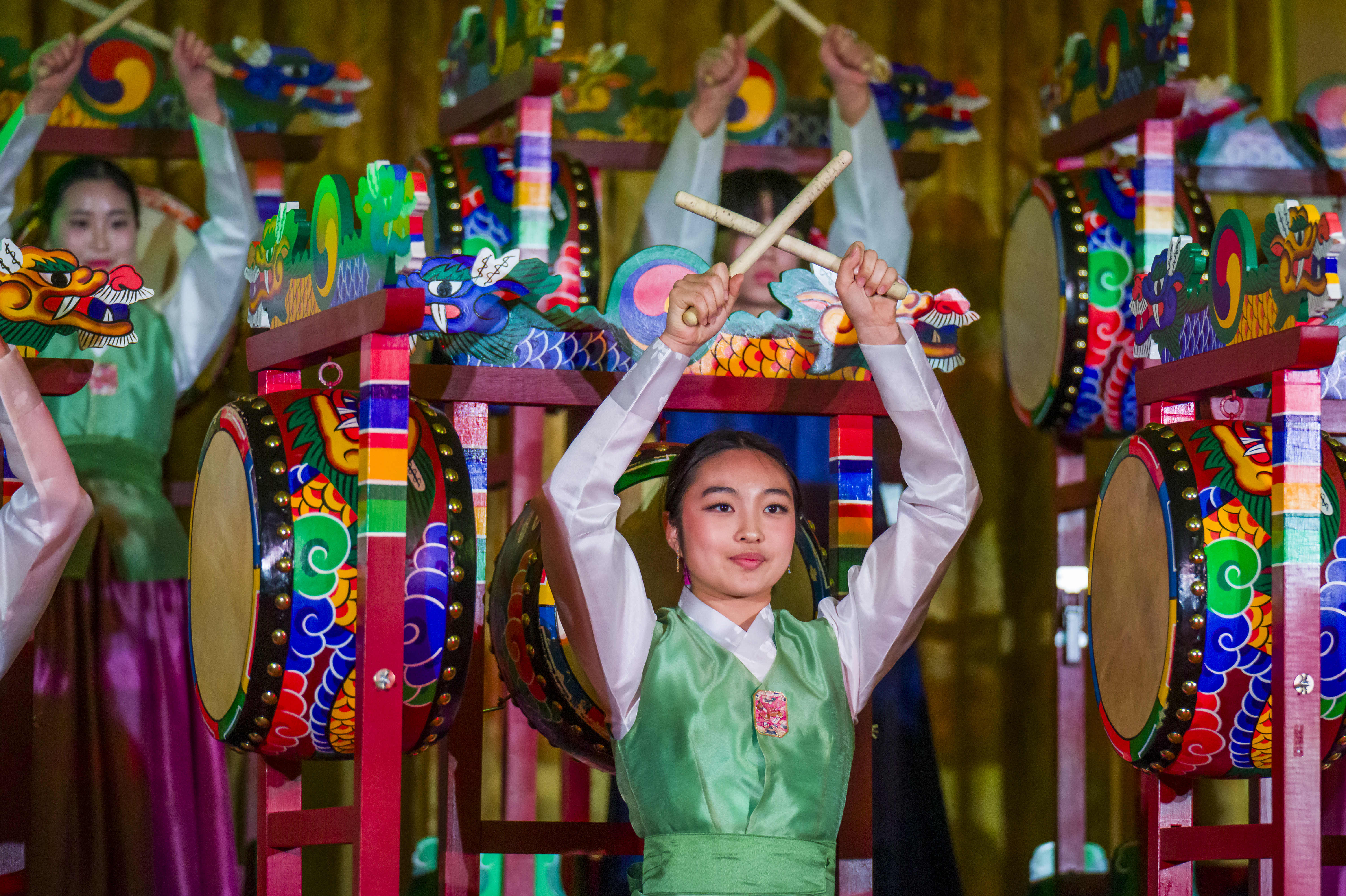 Members of Jeong Arts and Culture perform the Samgomu, a...