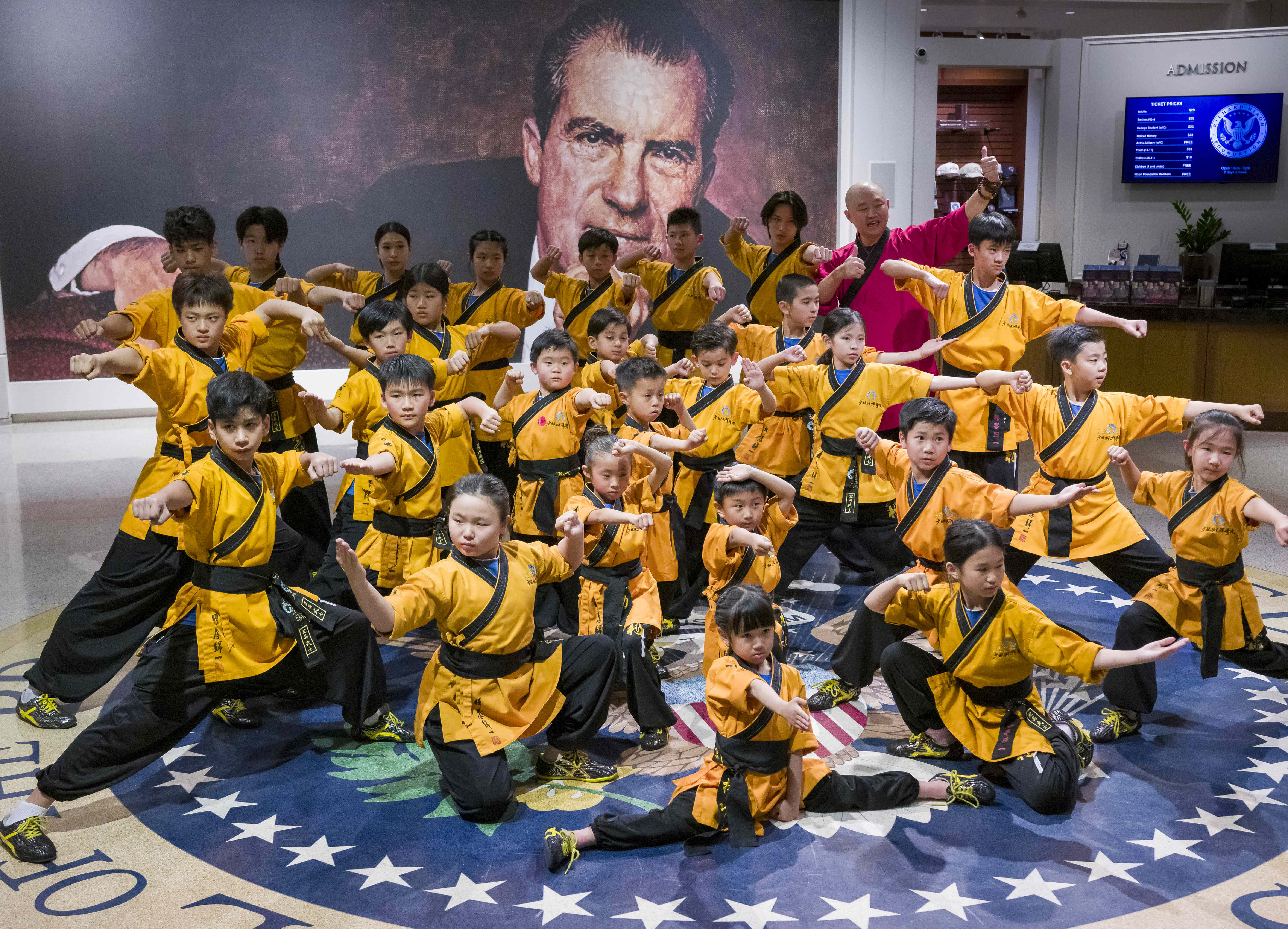 Members of the Shaolin Kung Fu Chan Academy pose for...