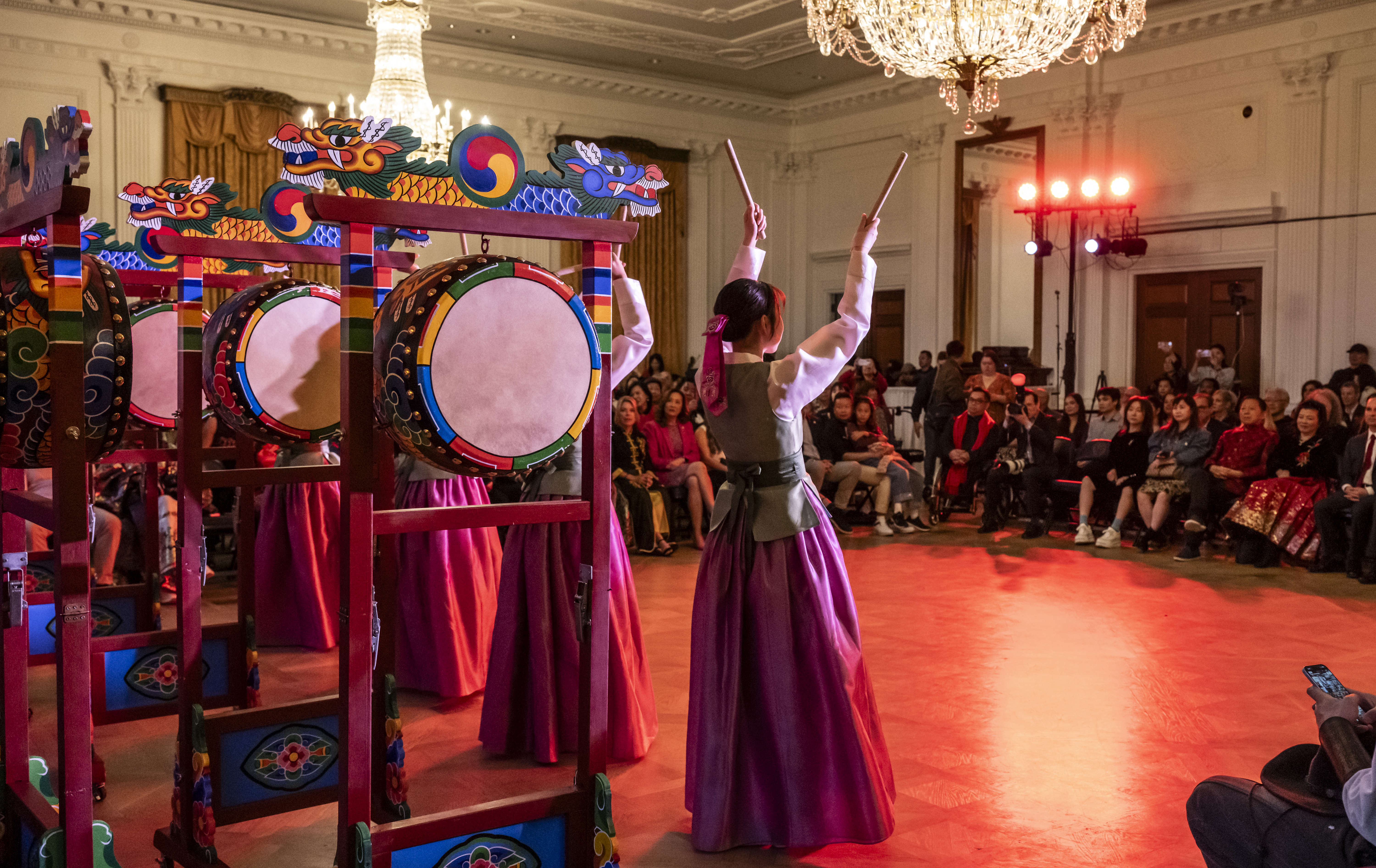 Members of Jeong Arts and Culture perform the Samgomu, a...