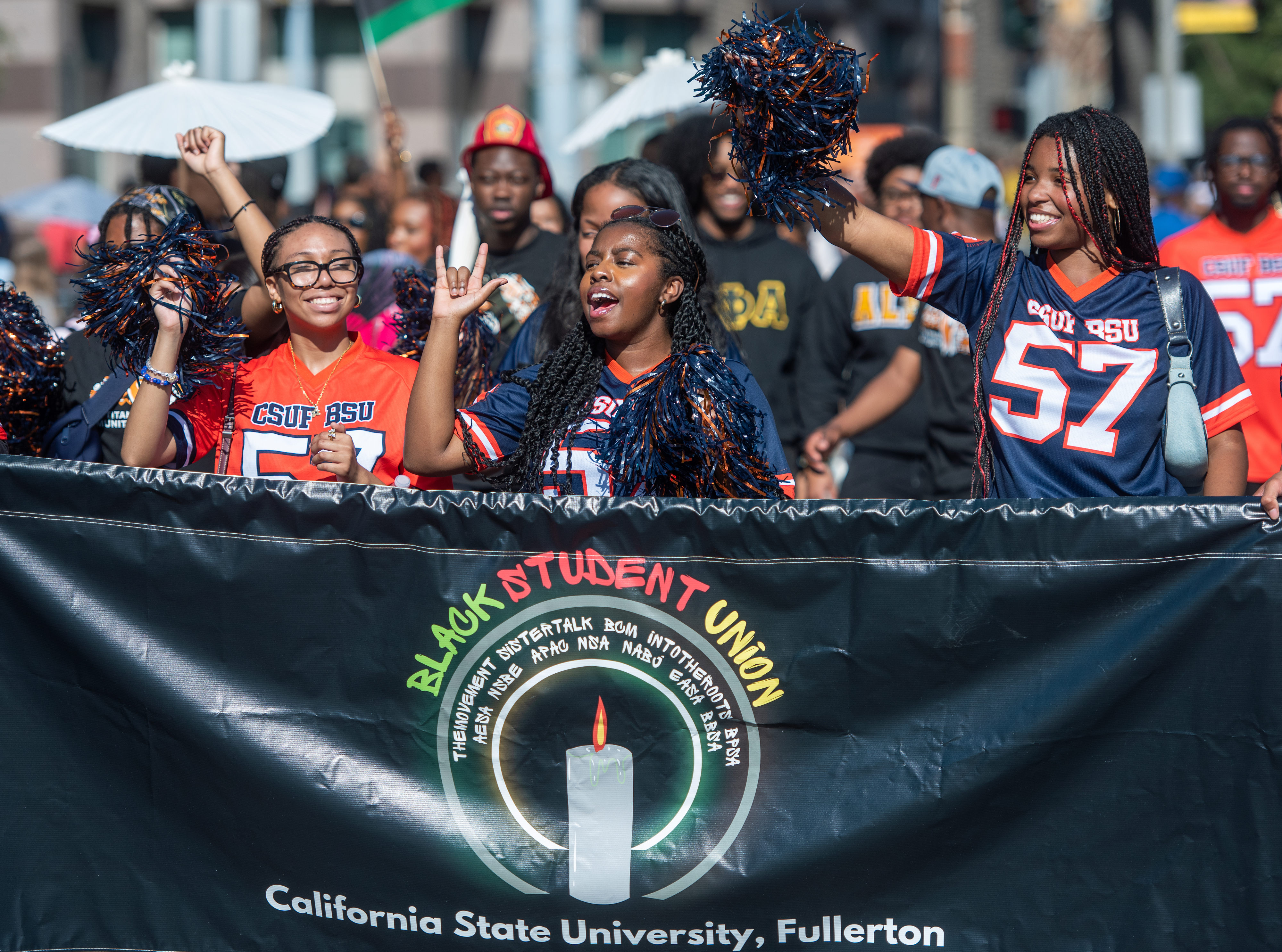 Members of Cal State Fullertonâs Black Student Union walk together...