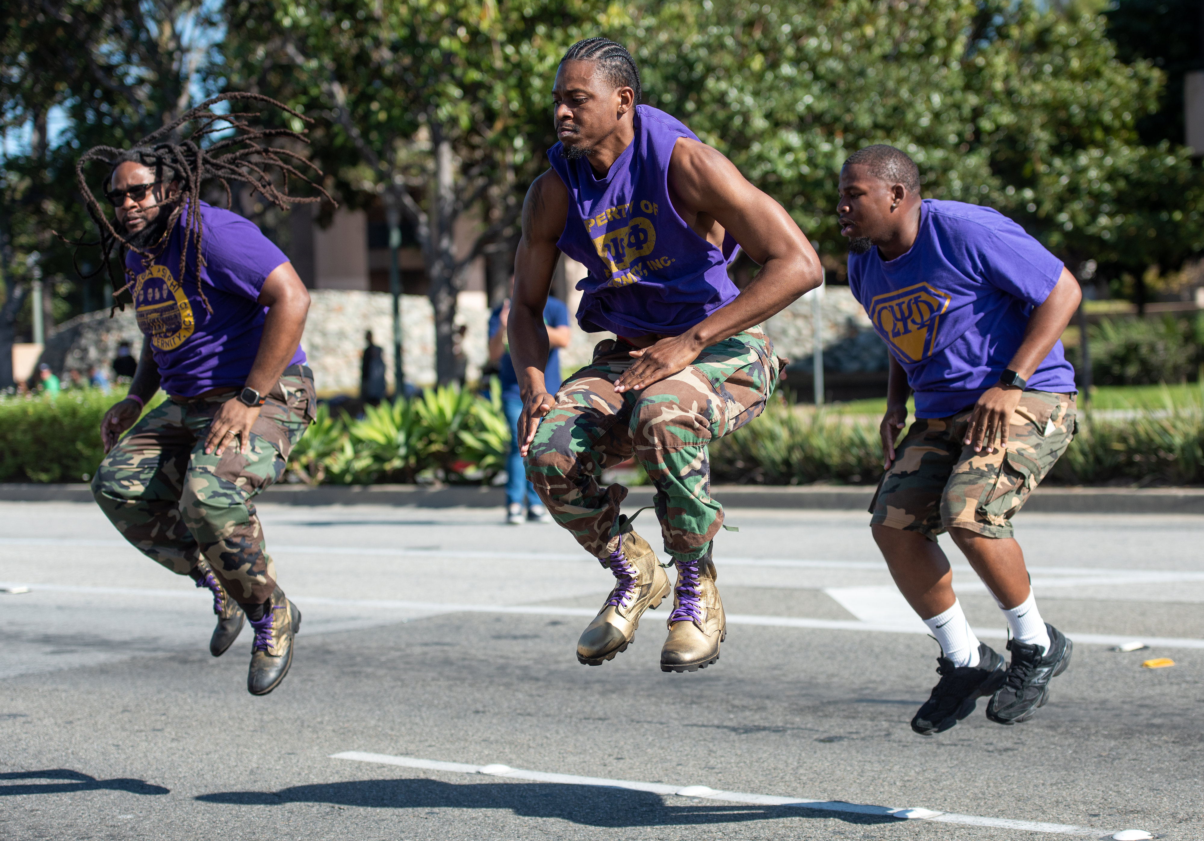 Members of Omega Psi Phi Fraternity Inc. dance their way...