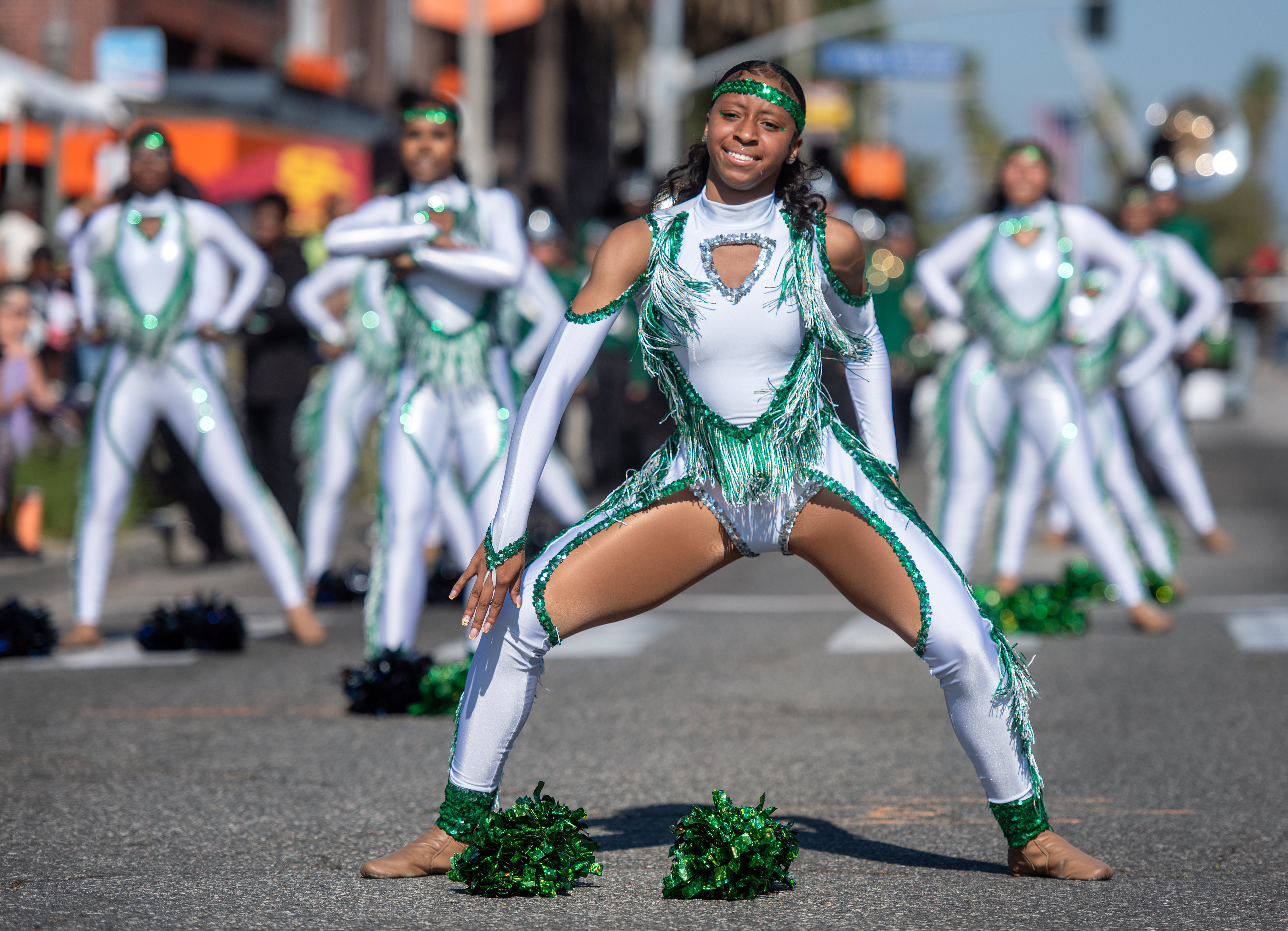 Students from Gardena High School dance and cheer their way...