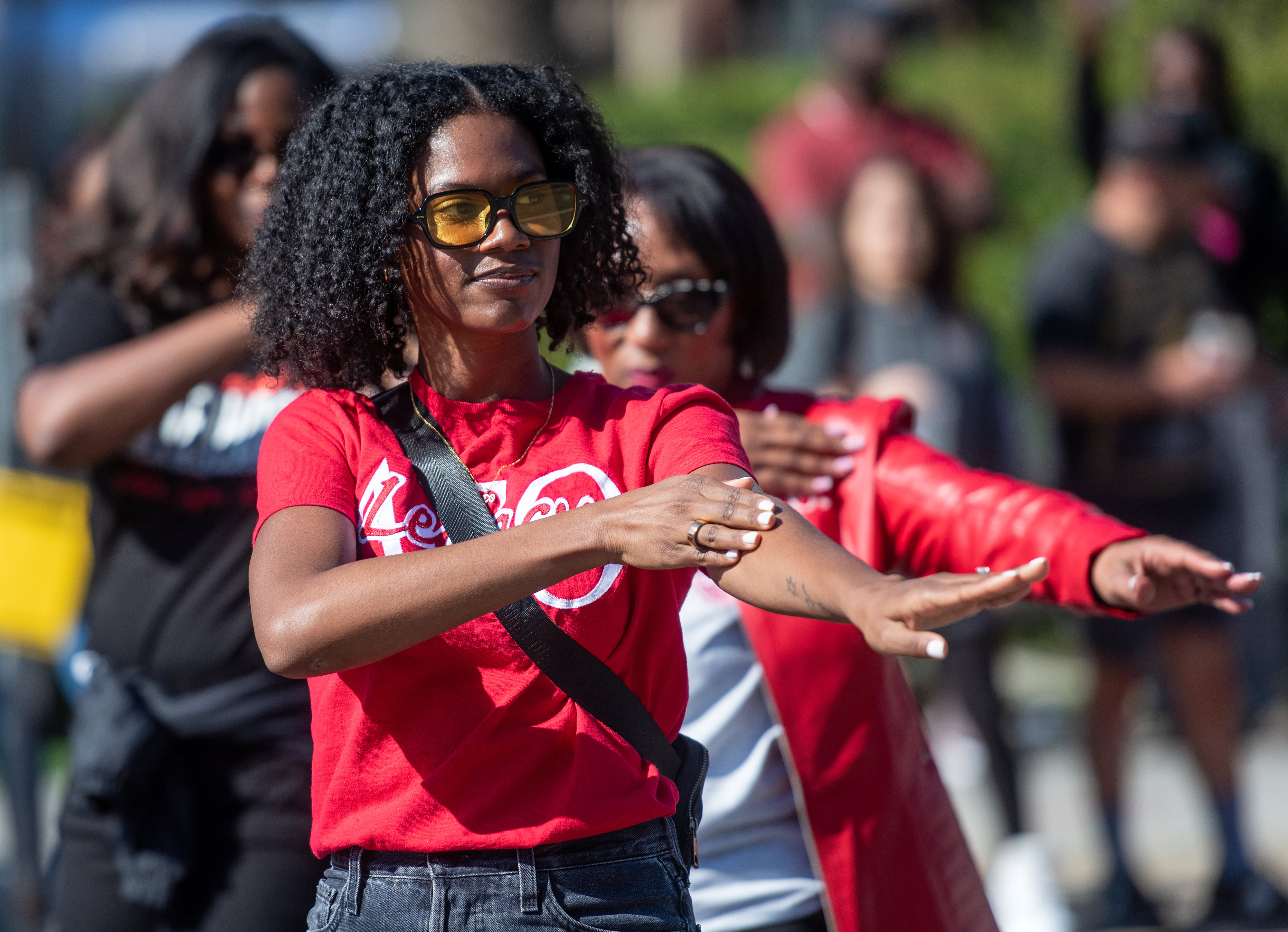 Members of Delta Sigma Theta Sorority Inc. dance their way...