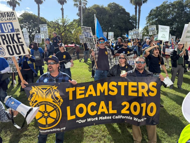Above, members of the Teamsters Local 2010 picket outside Cal State University's Chancellor's Office in Long Beach for higher wages and benefits on Nov. 18, 2025. About 1,100 union skilled trades workers with the Teamsters are preparing to strike 22 California State University campuses on Feb. 17-20. (Courtesy of Teamsters Local 2010)