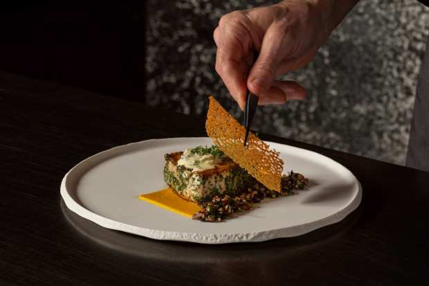 Sauteed Sustainable Fish on the refreshed Napa Rose menu at Disney's Grand Californian Hotel. (Courtesy of Disneyland)