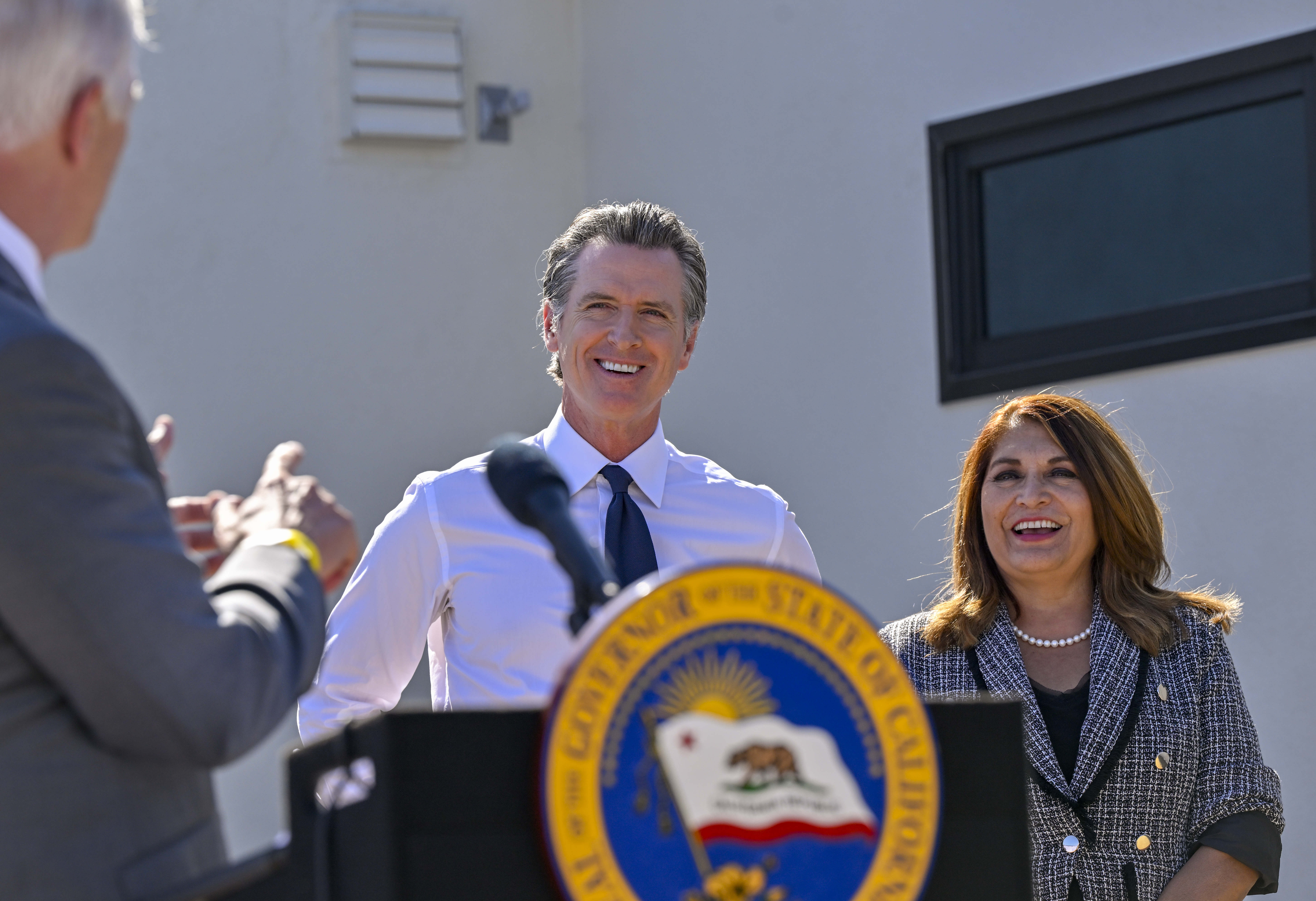 California State Senators Tom Umberg, left, thanks Governor Gavin Newsom,...