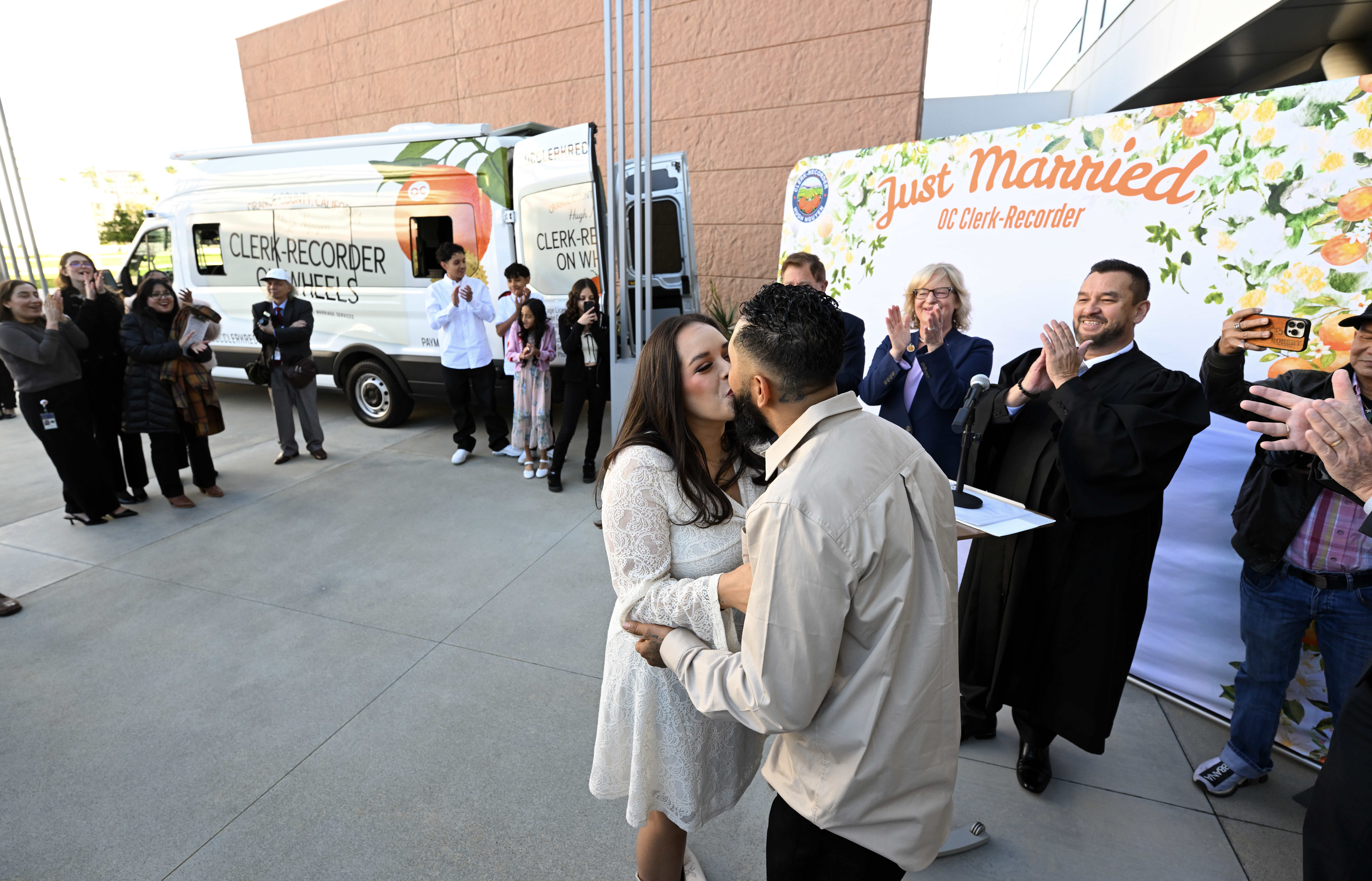Orange County Clerk-Recorder Hugh Nguyen marries Ashley and Luis Gomez...