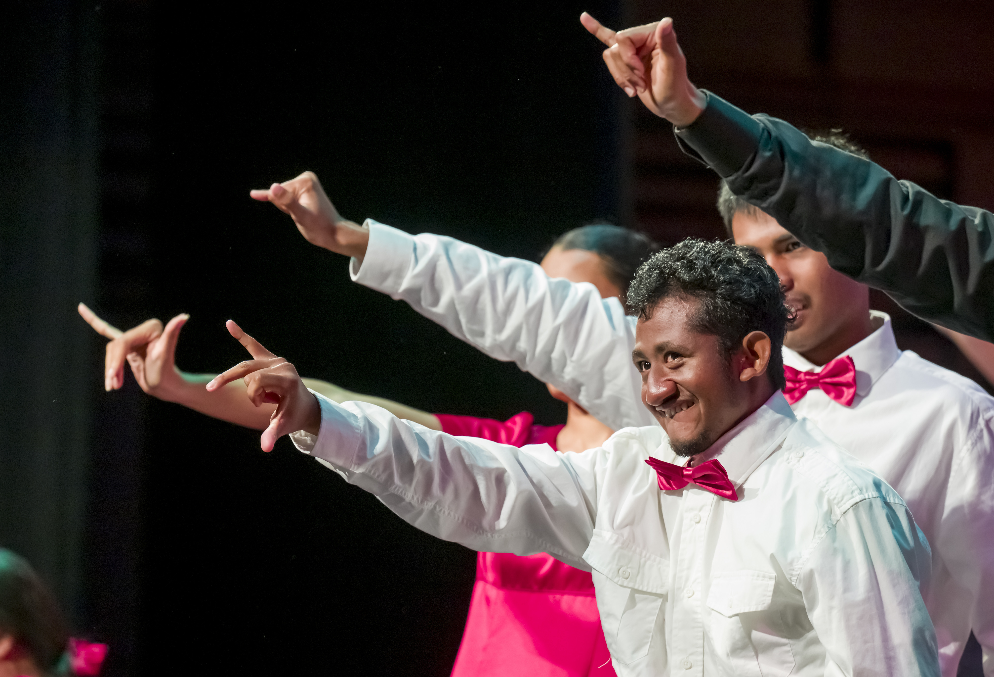 The Hope School Singers sign the word, forever, after performing...