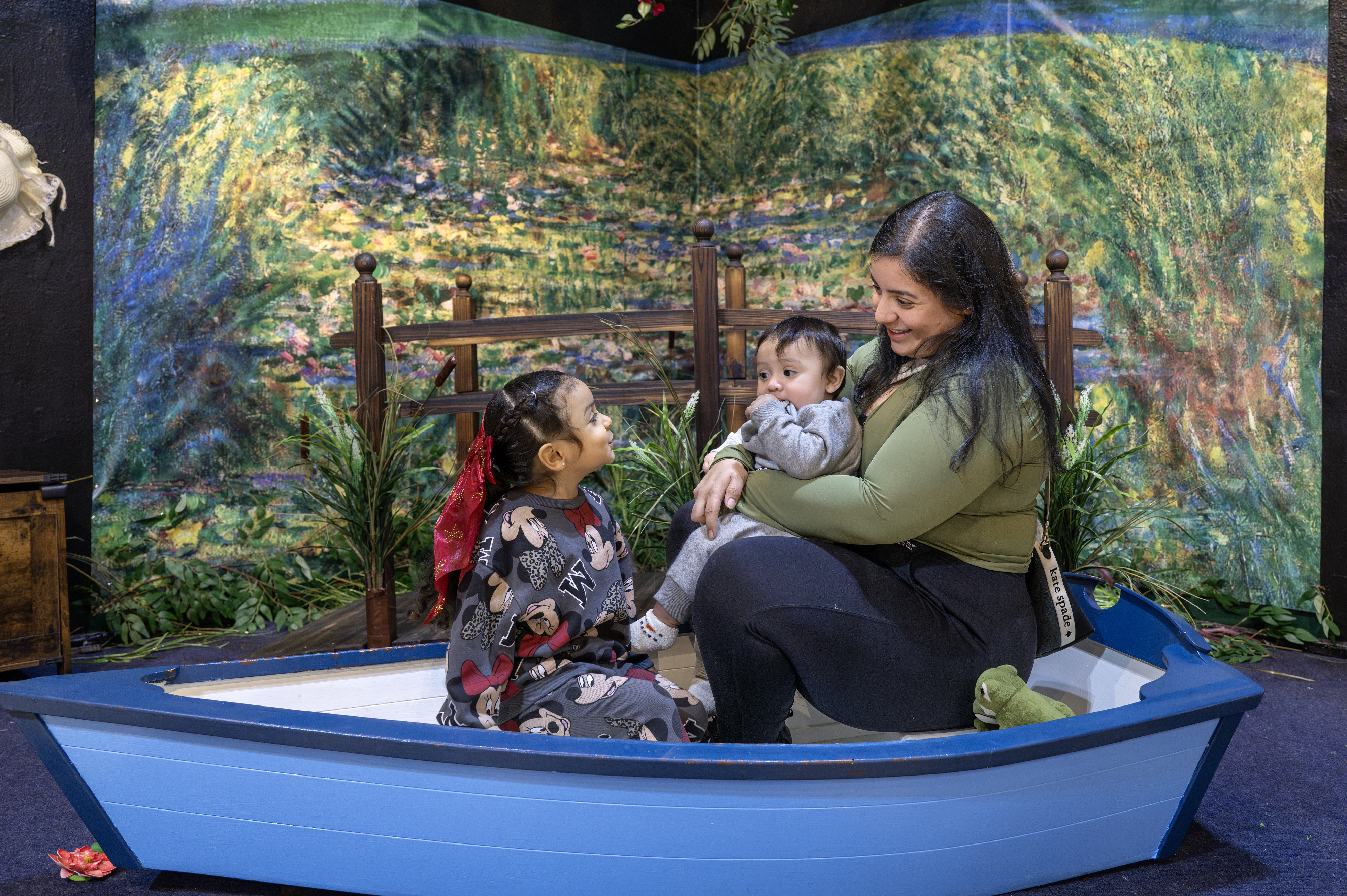 Stephanie Felix takes an imaginary boat ride with her children,...