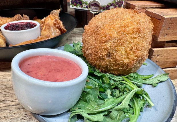 Reuben Ball with a Spicy Boysenberry Thousand Island Dressing available during the Knott's Boysenberry Festival. (Photo by Brady MacDonald, Orange County Register/SCNG)