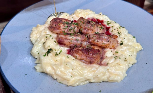 Boysenberry Cajun Shrimp with Vegetarian Creamy Orzo available during the Knott's Boysenberry Festival. (Photo by Brady MacDonald, Orange County Register/SCNG)