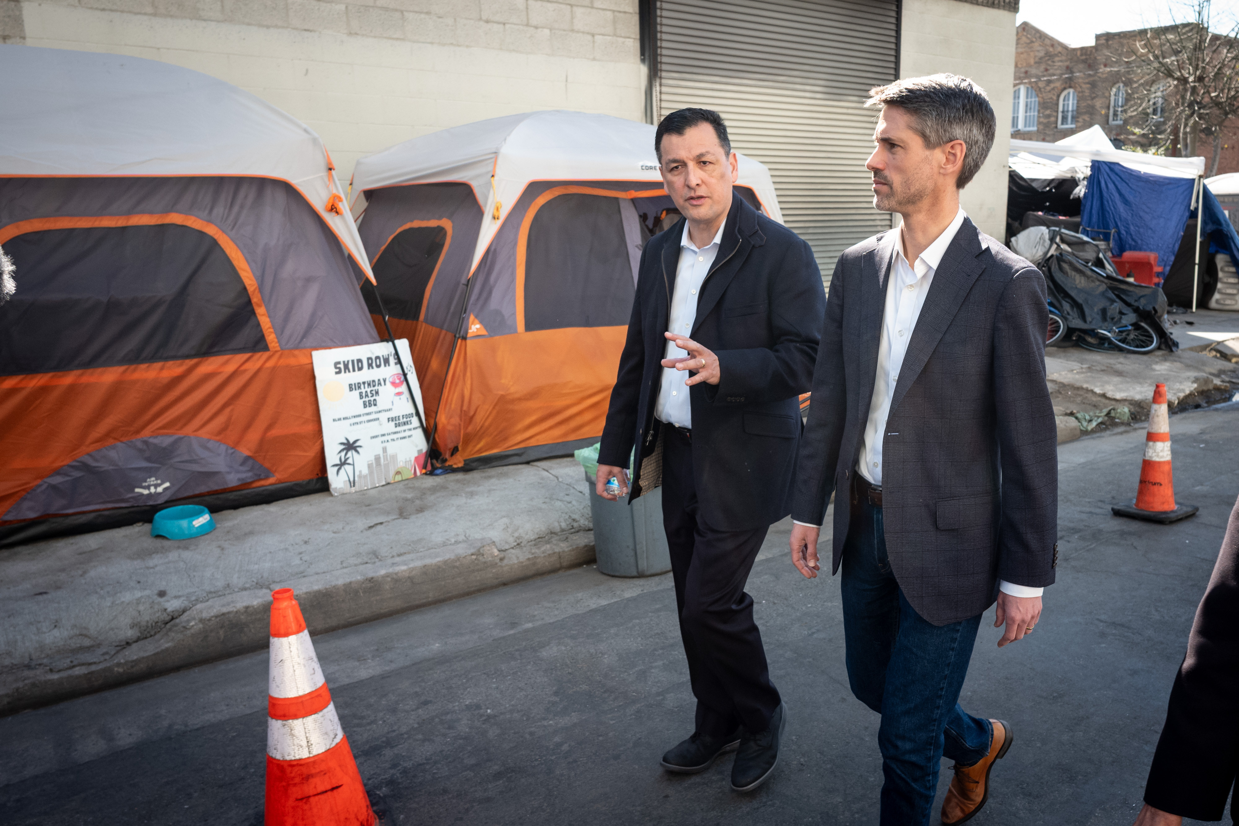 Sergio Mareno, business owner, left, and Matt Mahan, San Jose...