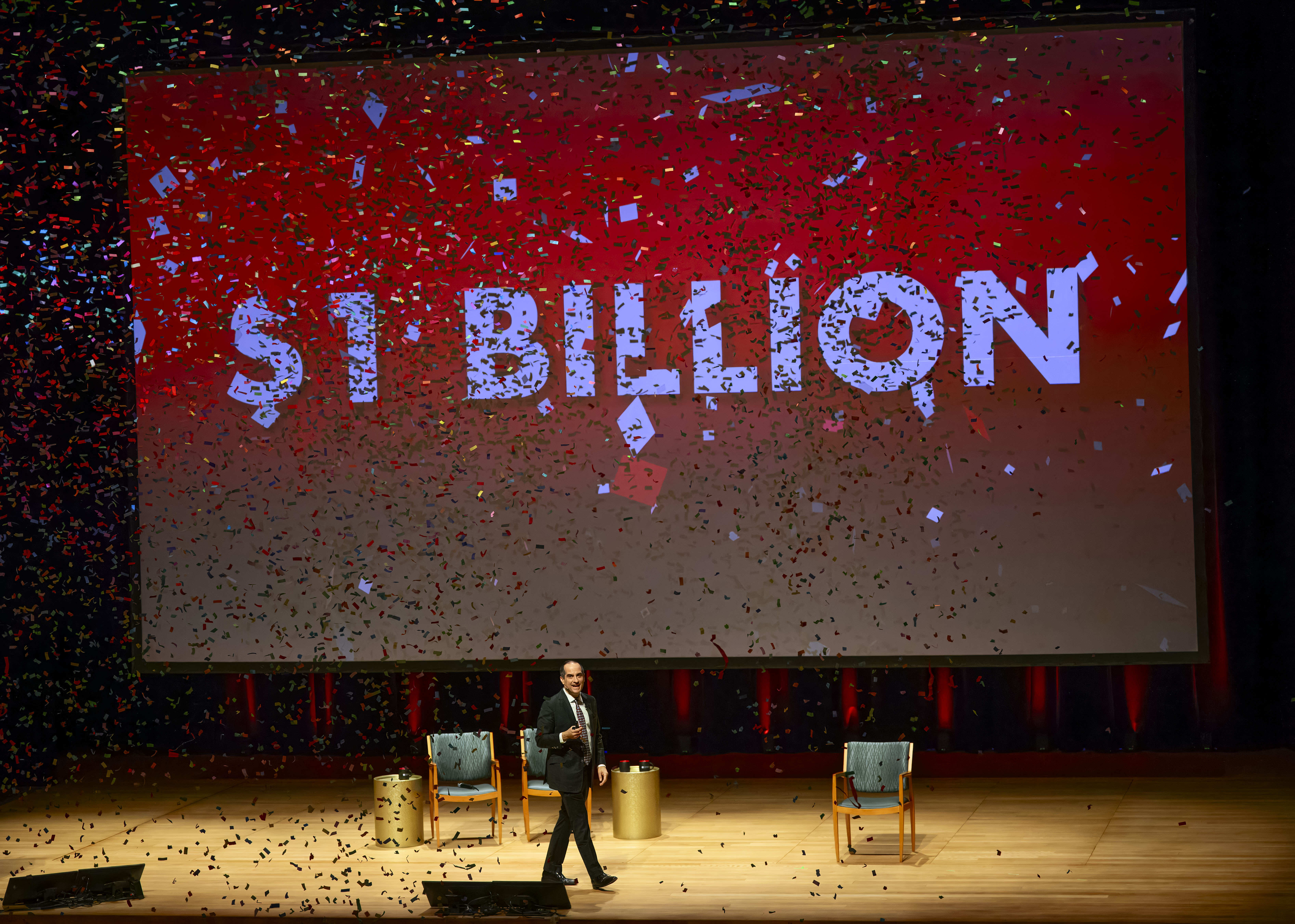 Confetti drops as Matt Parlow, president of Chapman University, finishes...