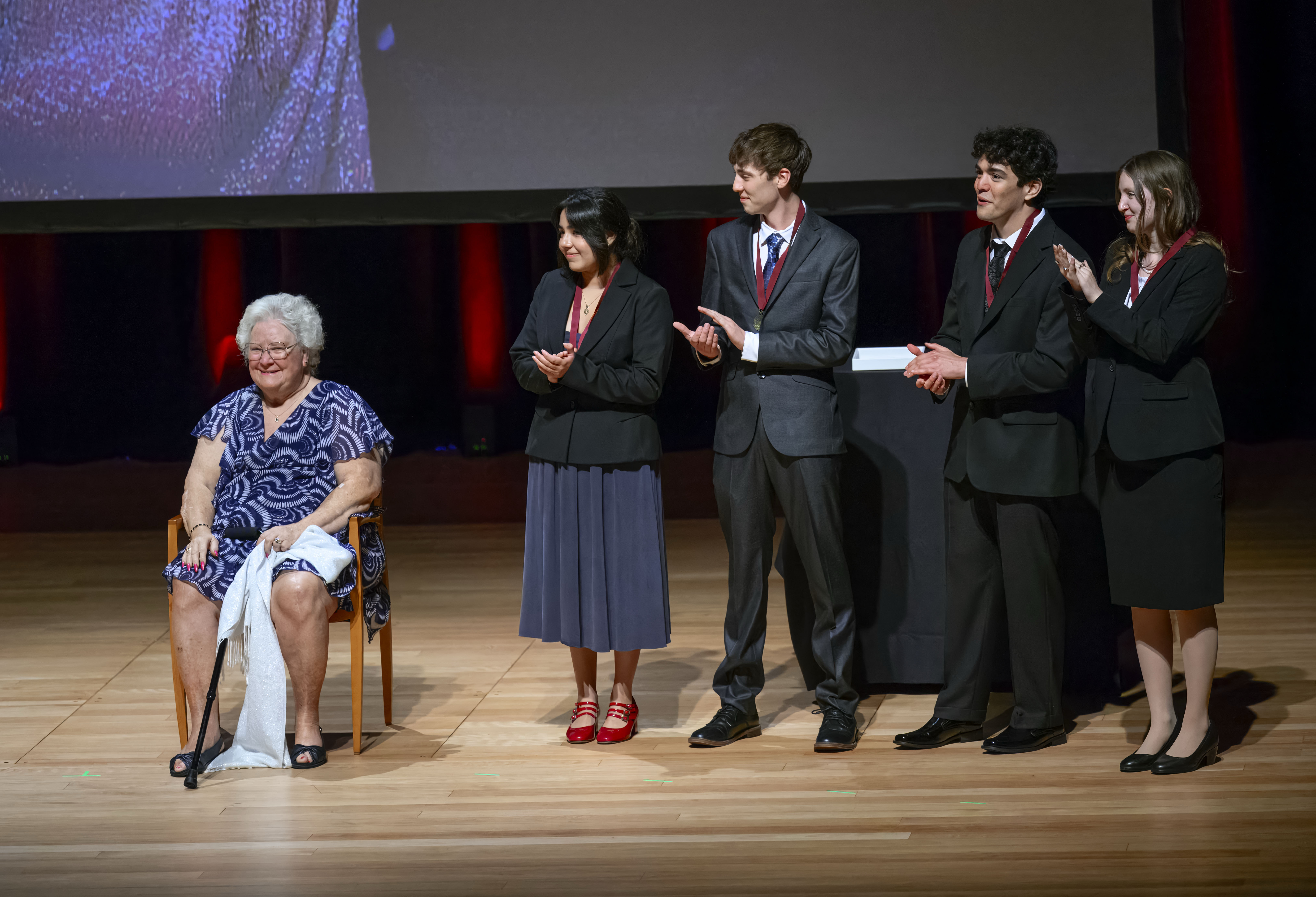 Klein Legacy Foundation founder Christine Cross, left, is honored by...