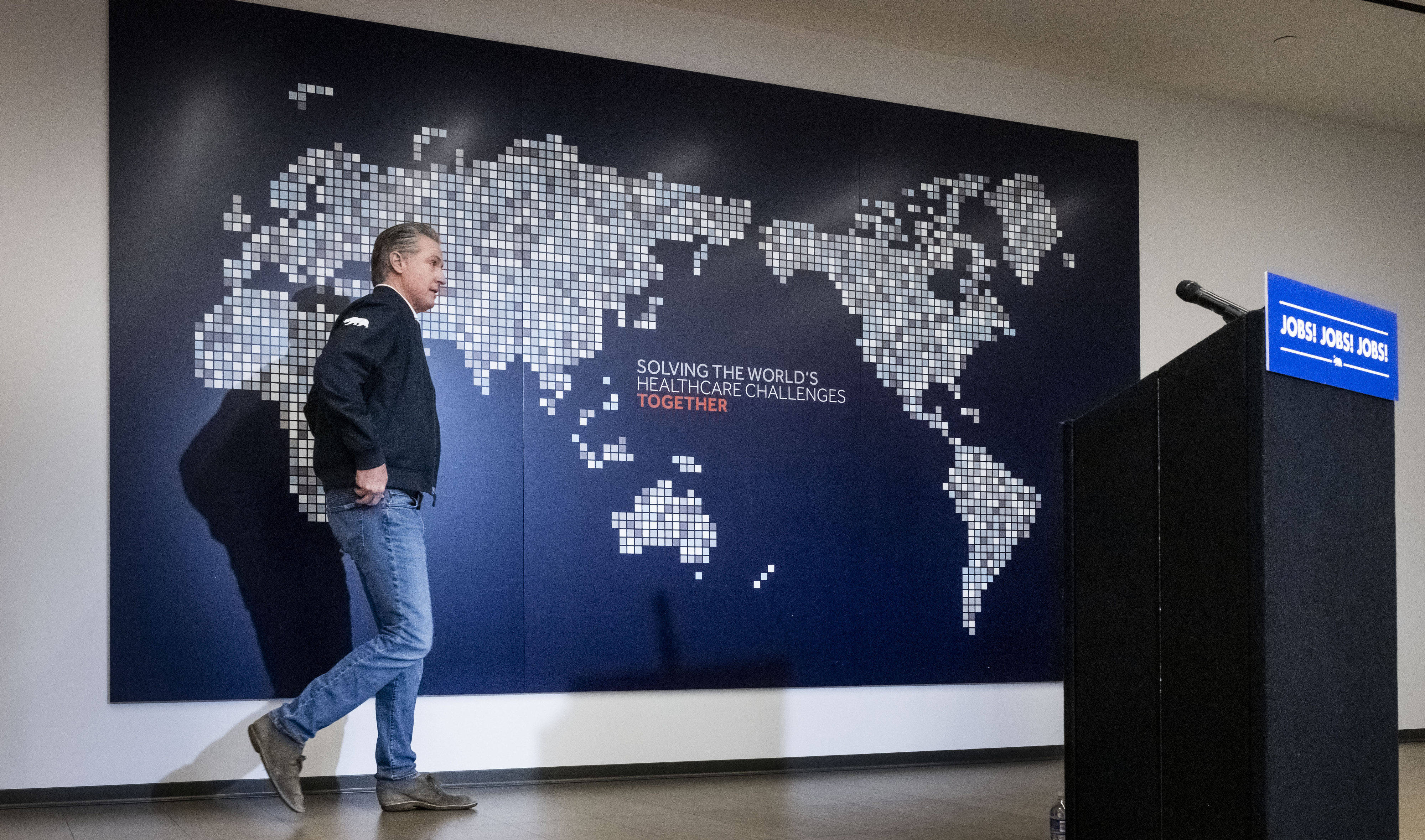 California Gov. Gavin Newsom enters a press conference for the...