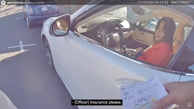 Laguna Beach City Manager Shohreh Dupuis interacts with an officer during a traffic stop recorded on police body-worn camera footage made public on Thursday, April 6. (Screenshot of video courtesy of City of Laguna Beach)