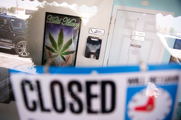 The Church of Peace and Glory in Costa Mesa on Tuesday, August 28, 2018. Despite its name, authorities say the facility that shared a parking lot with the 7-Eleven on Irvine Avenue at 17th Street did not appear to be using marijuana as part of any sort of religious service. Instead, it advertised itself on dispensary directory Weedmaps.com as a "recreational cannabis boutique" selling marijuana to anyone 21 and older with an ID. State regulators teamed up with local police to shut it down. (Photo by Kevin Sullivan, Orange County Register/SCNG)