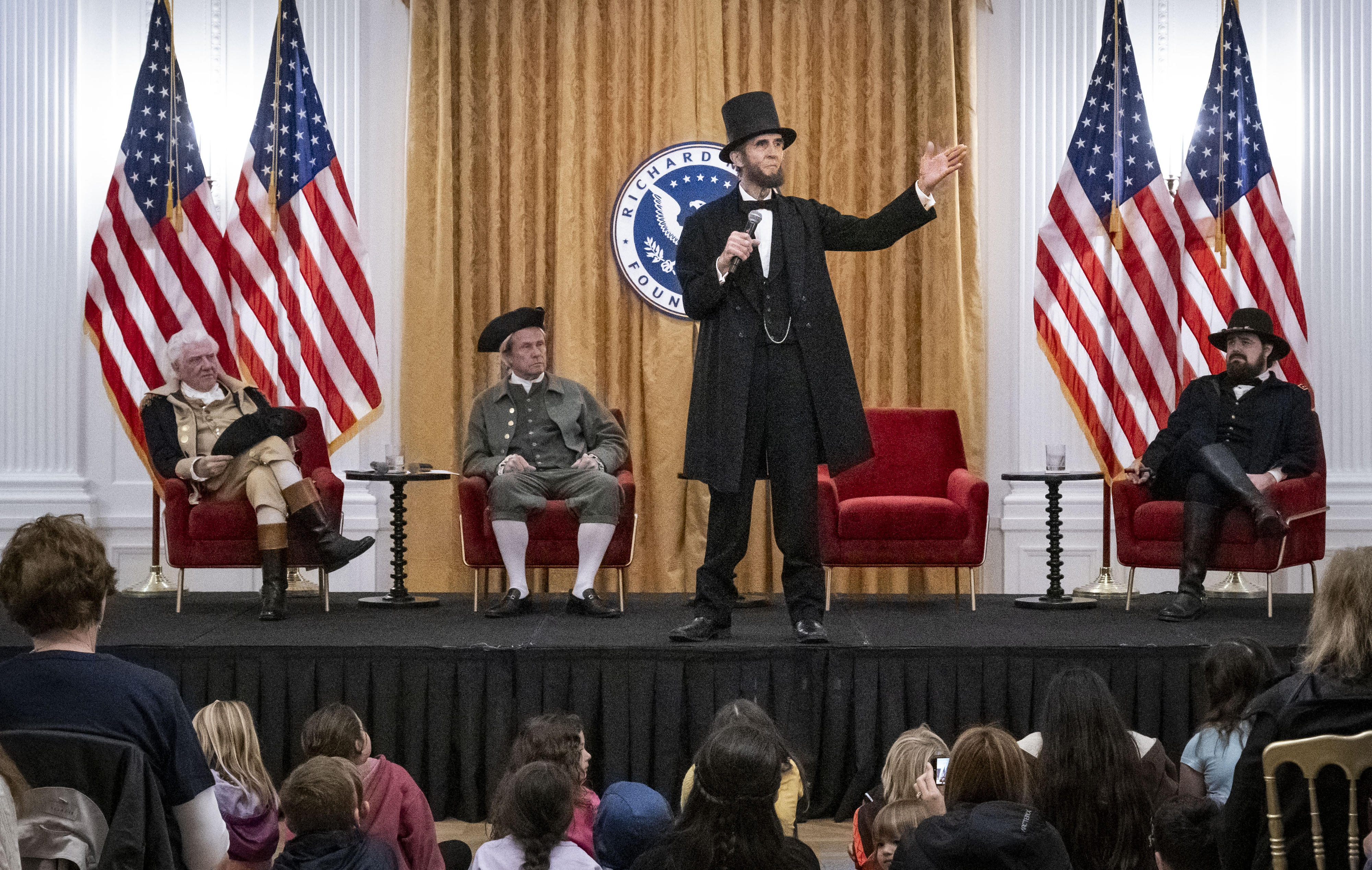 Abraham Lincoln, played by Robert Broski, gives a speech during...