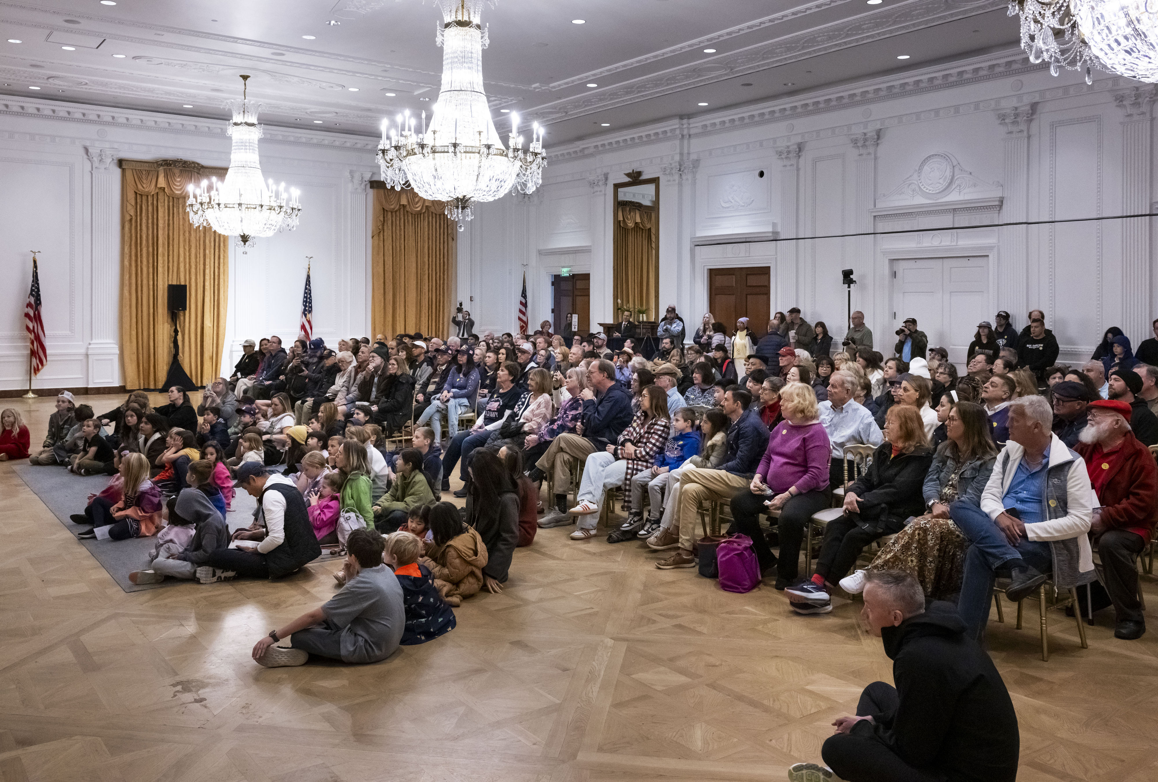 Visitors listen to speaches from past presidents during a Presidentsâ...