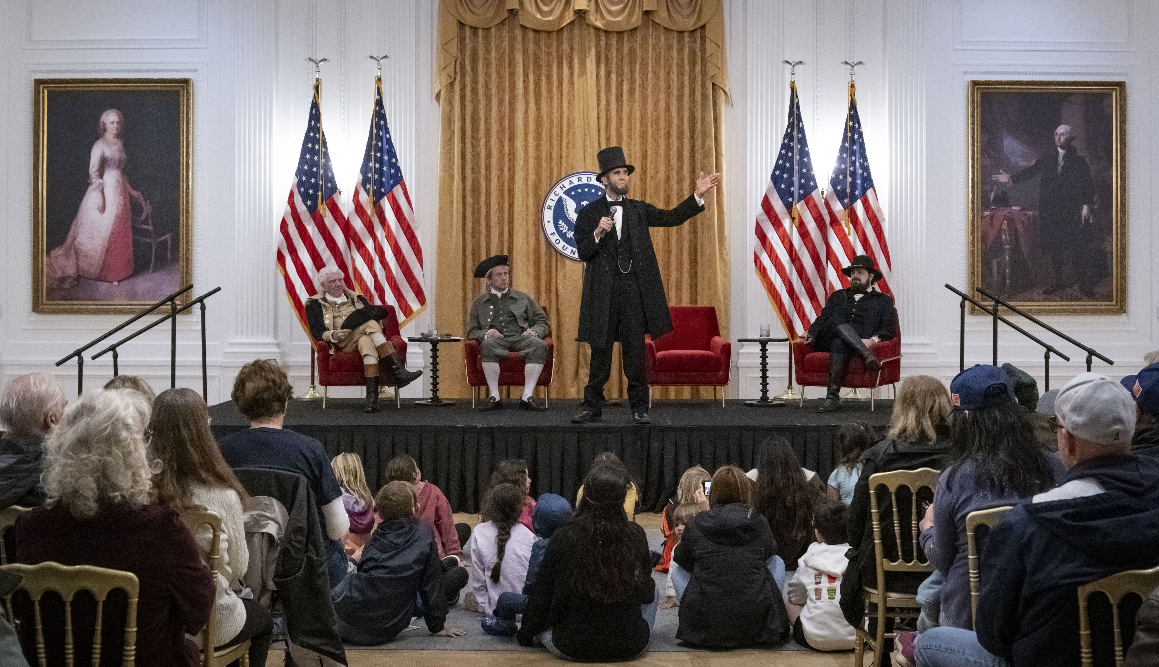 Abraham Lincoln, played by Robert Broski, gives a speech during...