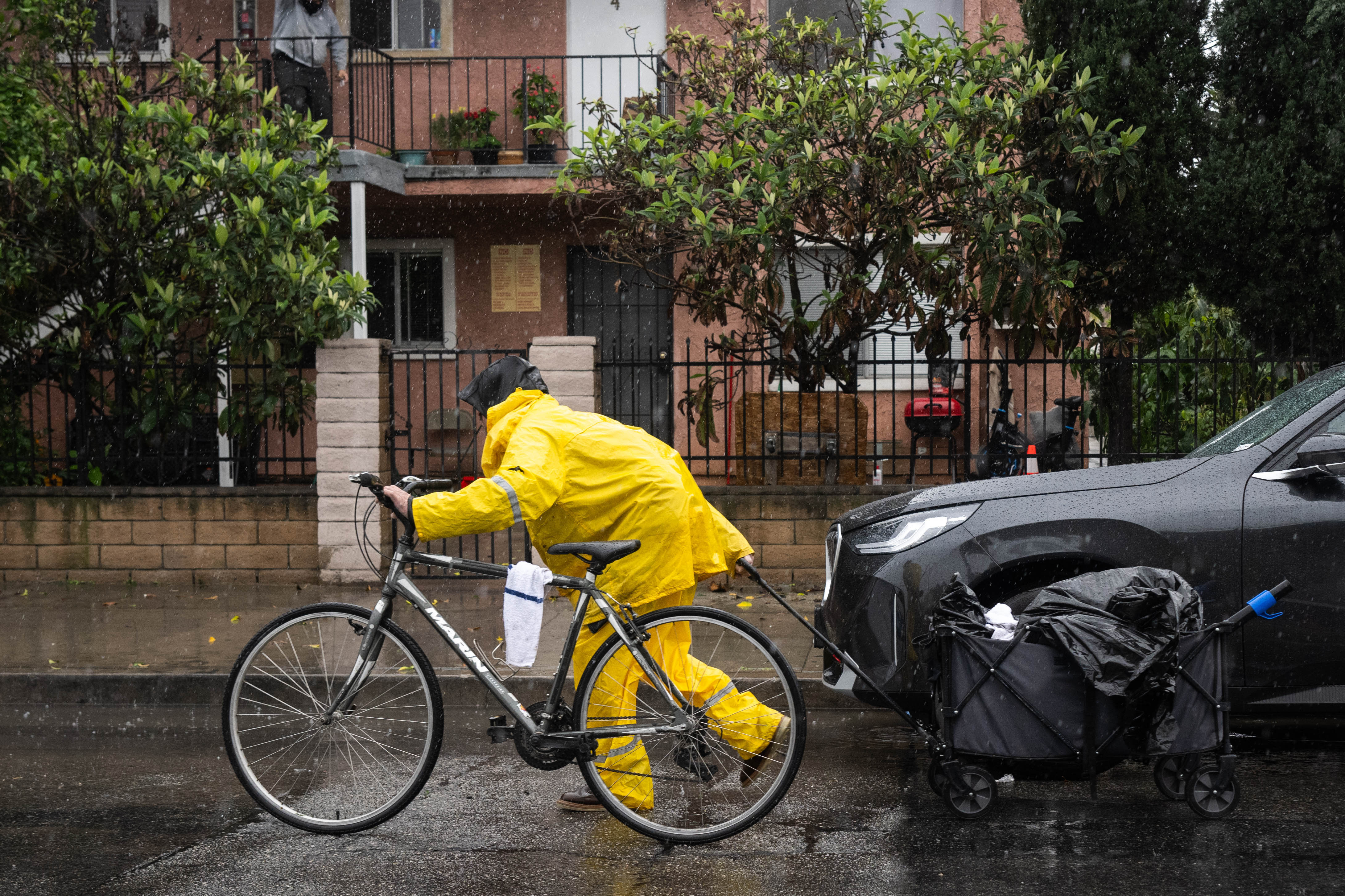 A man makes his way through North Hollywood during a...