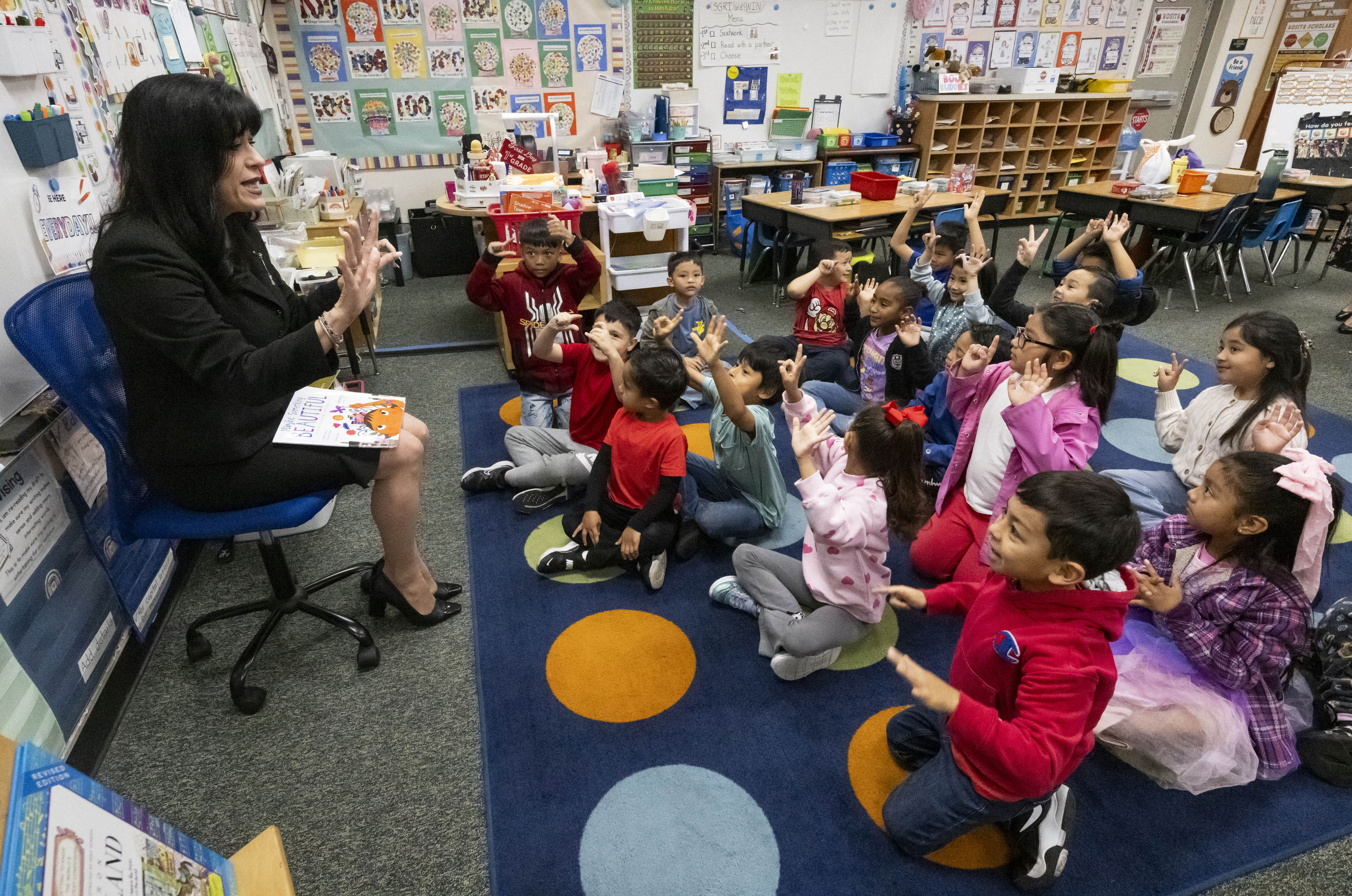 Garden Grove Unified School District Superintendent Gabriela Mafi talks with...