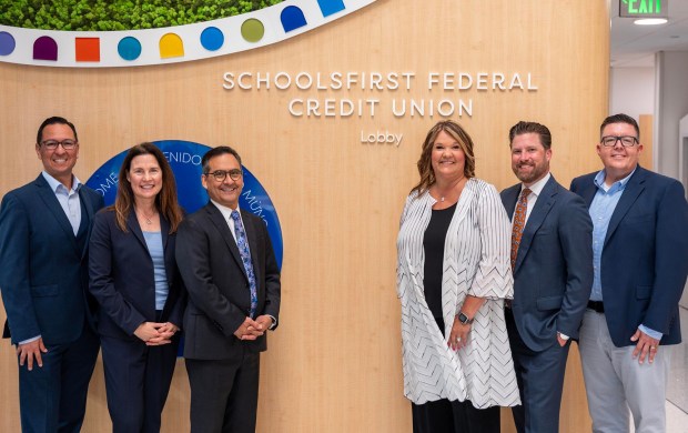 SchoolsFirst Federal Credit Union donated $3 million in 2025 to CHOC in Orange, now called Rady Children's Health's, for its nine-story ambulatory building. Seen at the tower's debut in Orange are SchoolsFirst FCU's Brent Tercero, executive director of advocacy; Diana Kot, vice president of member development; Jose Lara, president; Kristin Crellin, senior vice president of community and membership development, Josh Smith, vice president of school and community relations and Michael Faulwell, chief financial officer. (Photo courtesy of SchoolsFirst Federal Credit Union)