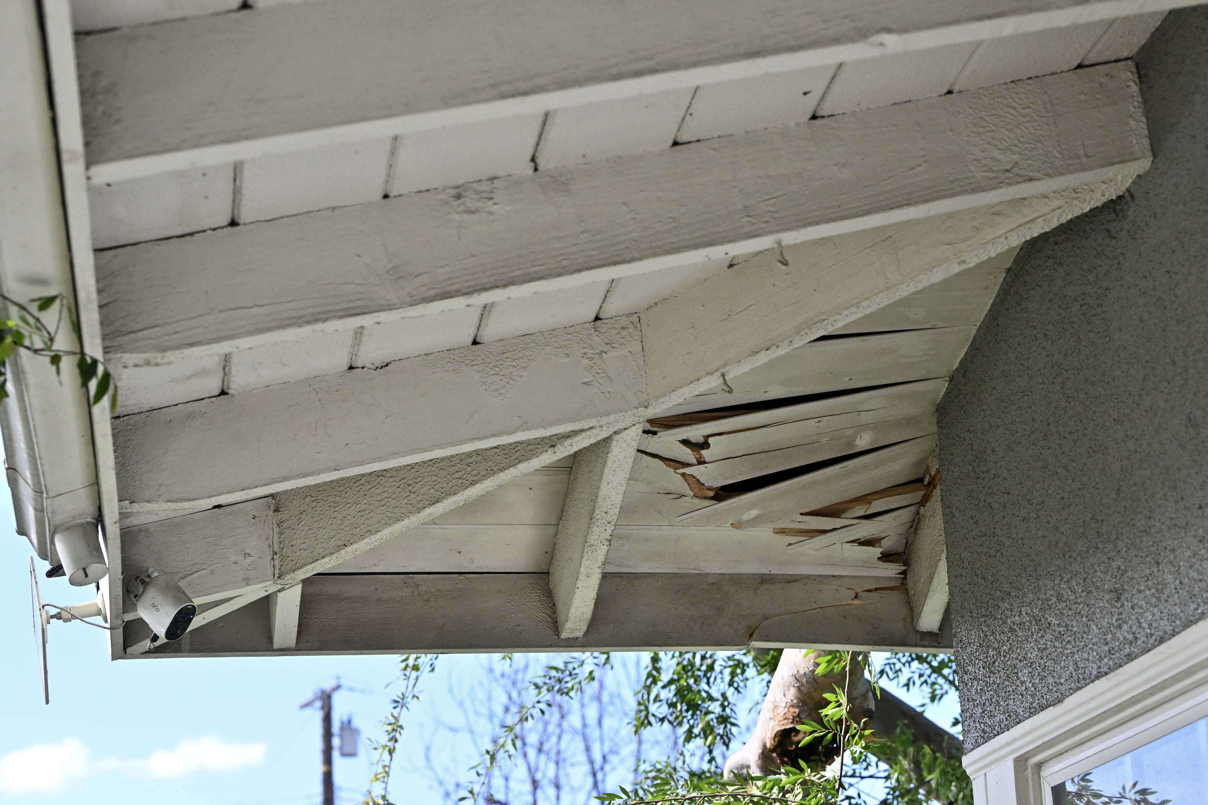 Damage to Vicky Aguilarâs home from a tree that fell...
