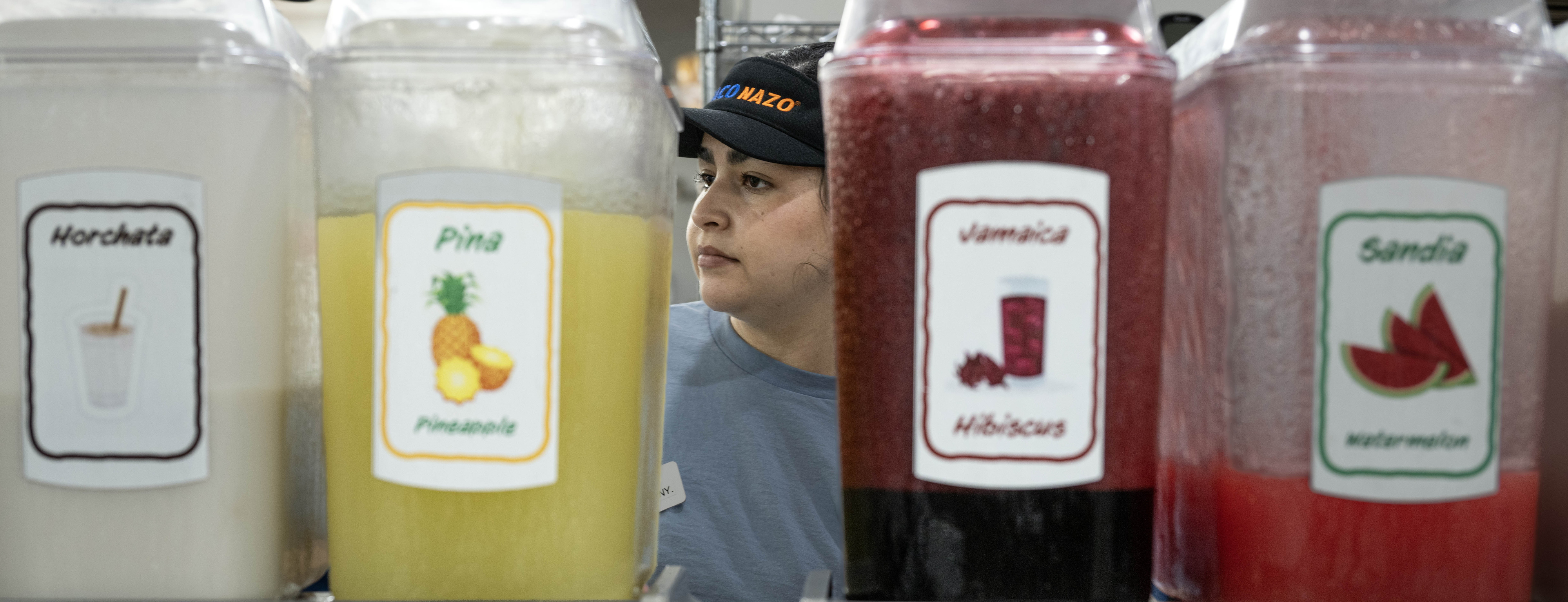 Taco Nazo employee Estefany Garcia works the counter at the...