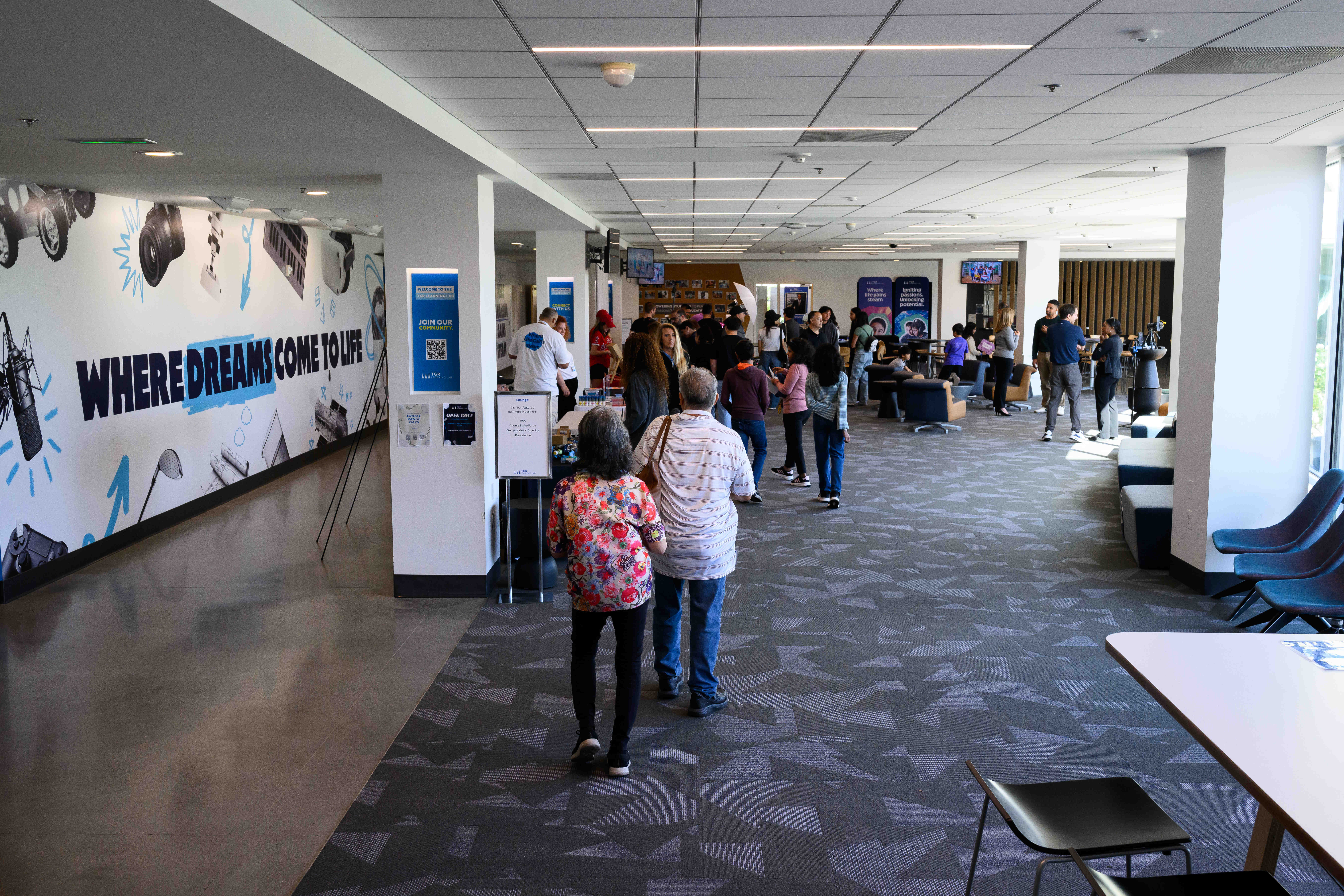 People arrive during an event celebrating the 20th anniversary of...