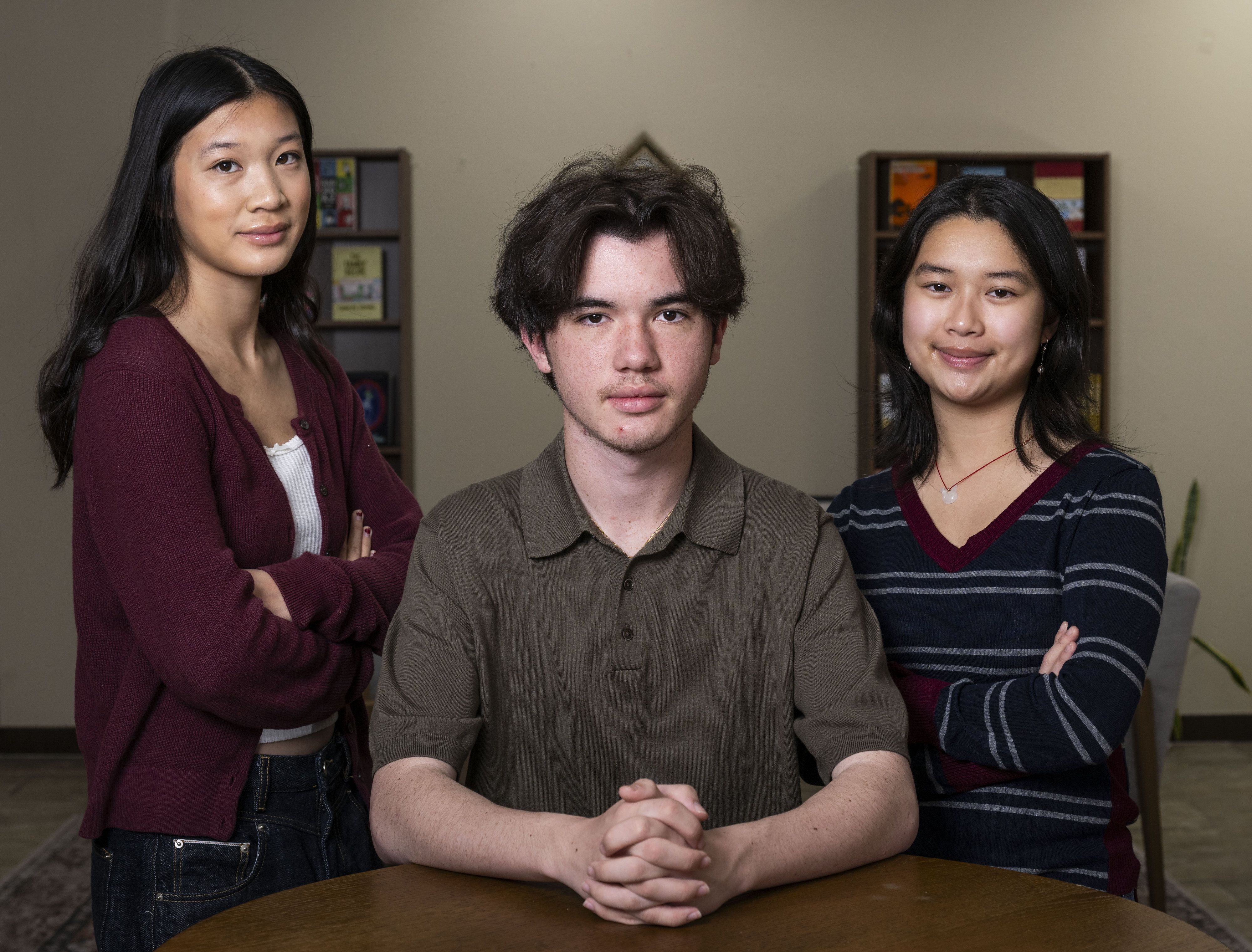 Maya Do, Seven Zenor and Sophia Tran, from left, at...